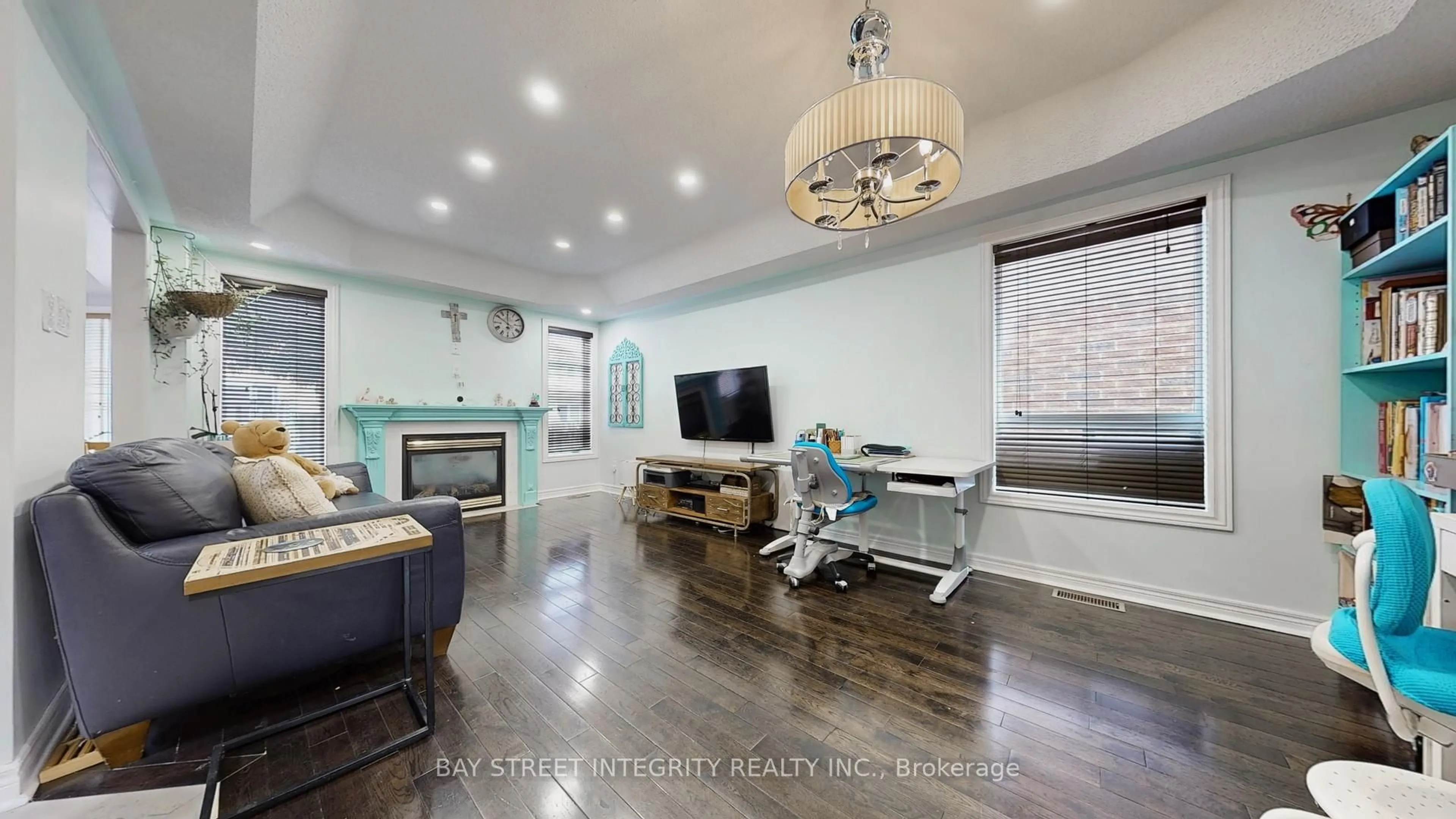 Living room with furniture, wood/laminate floor for 24 Ian Dr, Georgina Ontario L4P 4H1