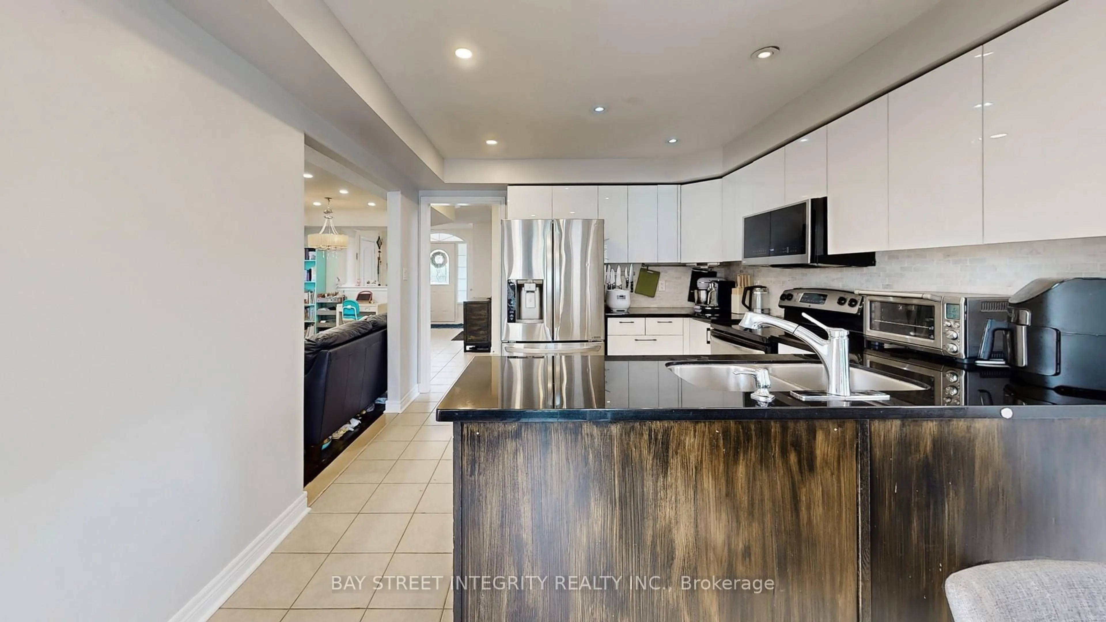 Open concept kitchen, ceramic/tile floor for 24 Ian Dr, Georgina Ontario L4P 4H1