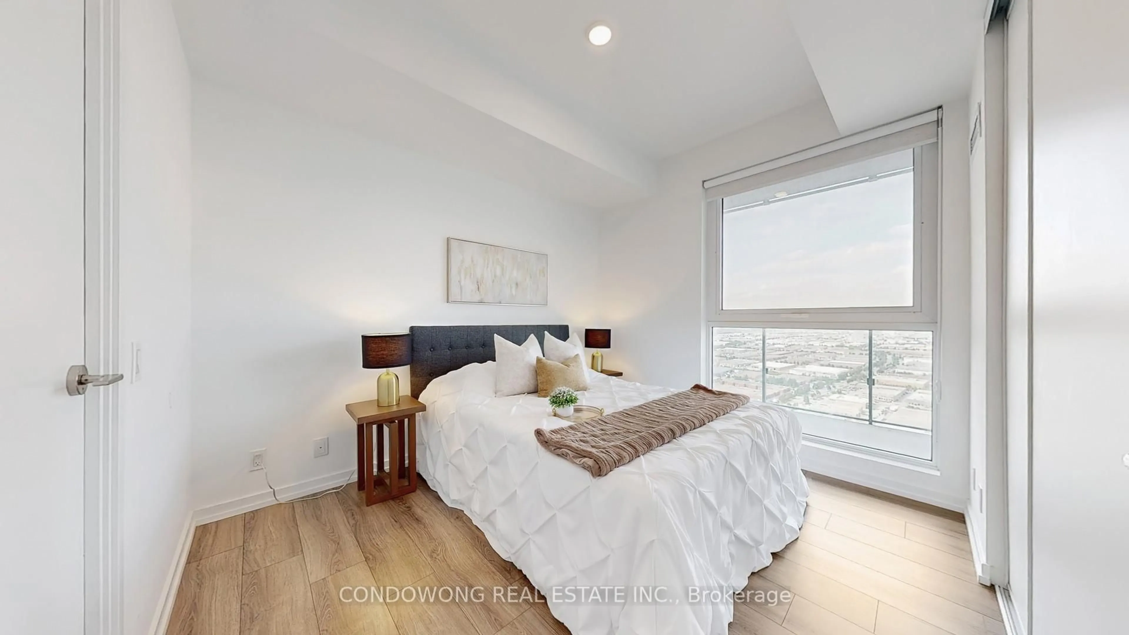 Bedroom with bed, wood/laminate floor for 7890 Jane St #4209, Vaughan Ontario L4K 0K9