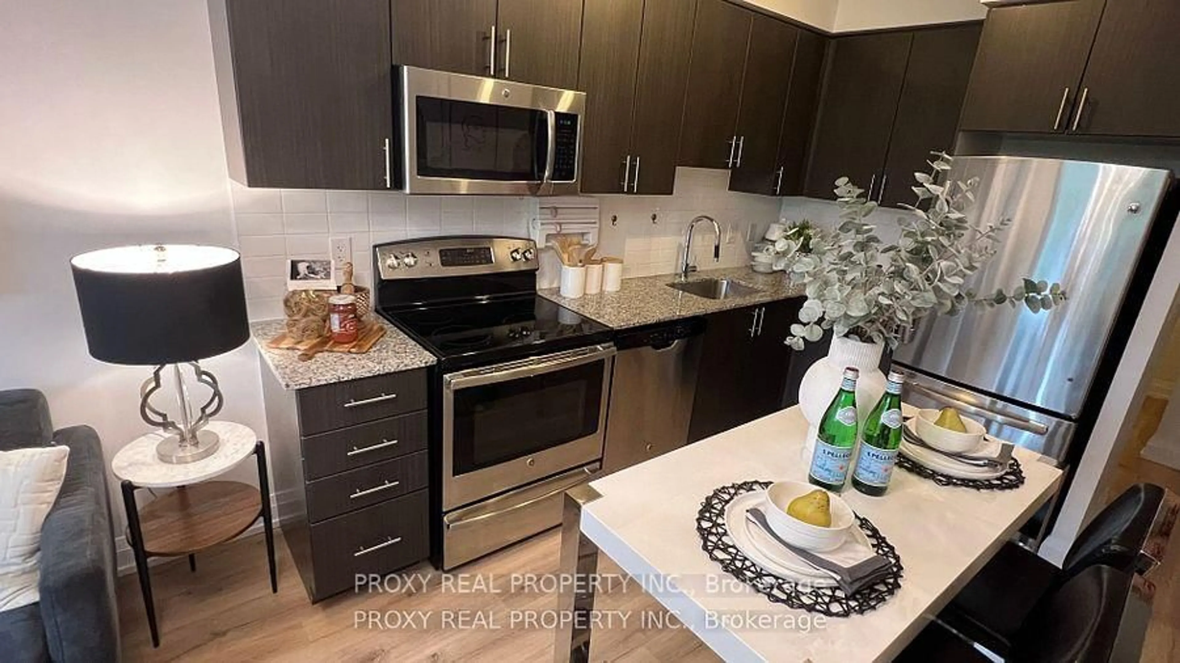 Standard kitchen, wood/laminate floor for 7165 Yonge St #215, Markham Ontario L3T 0C9
