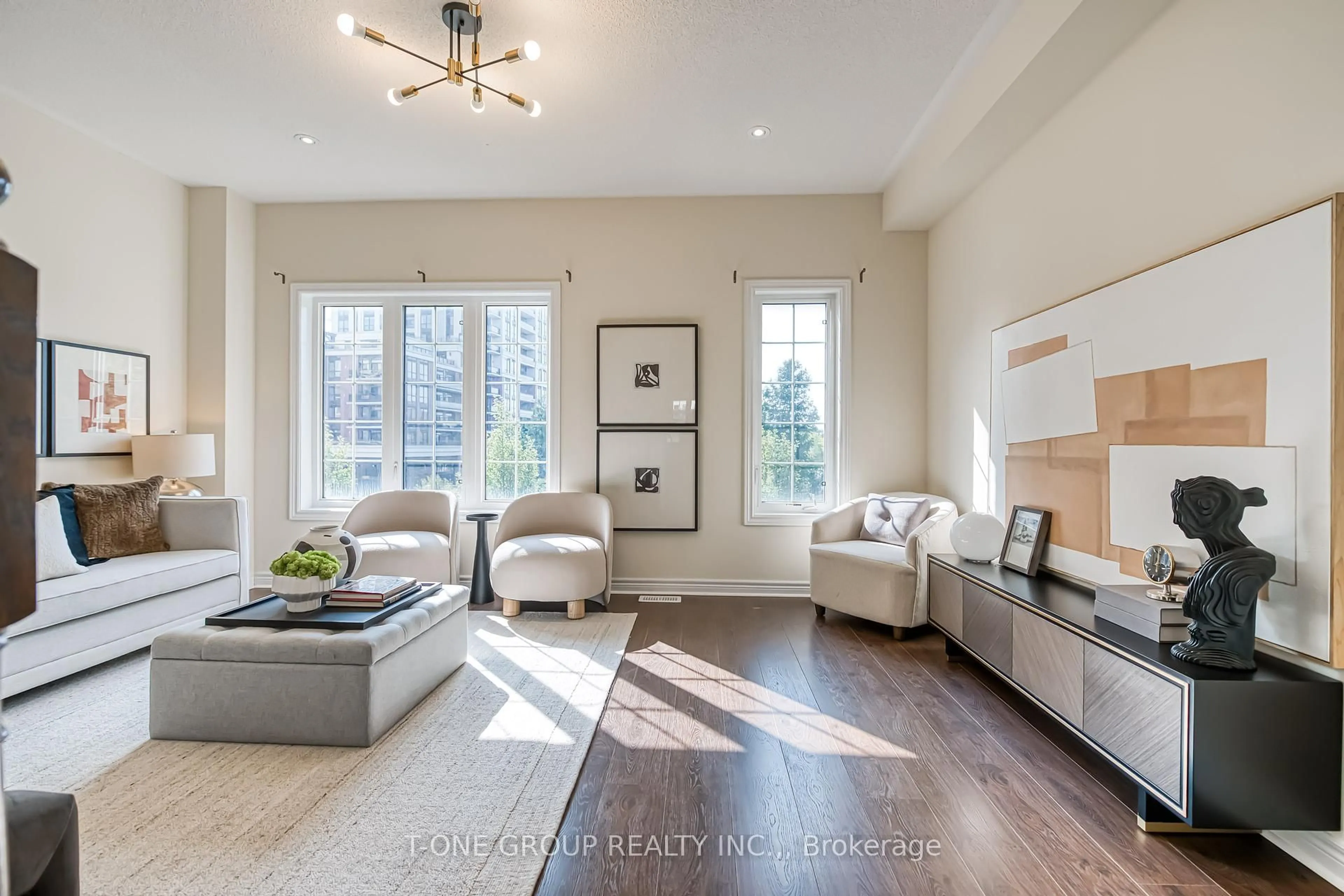 Living room with furniture, wood/laminate floor for 36 Battista Perri Dr, Markham Ontario L6E 0R6