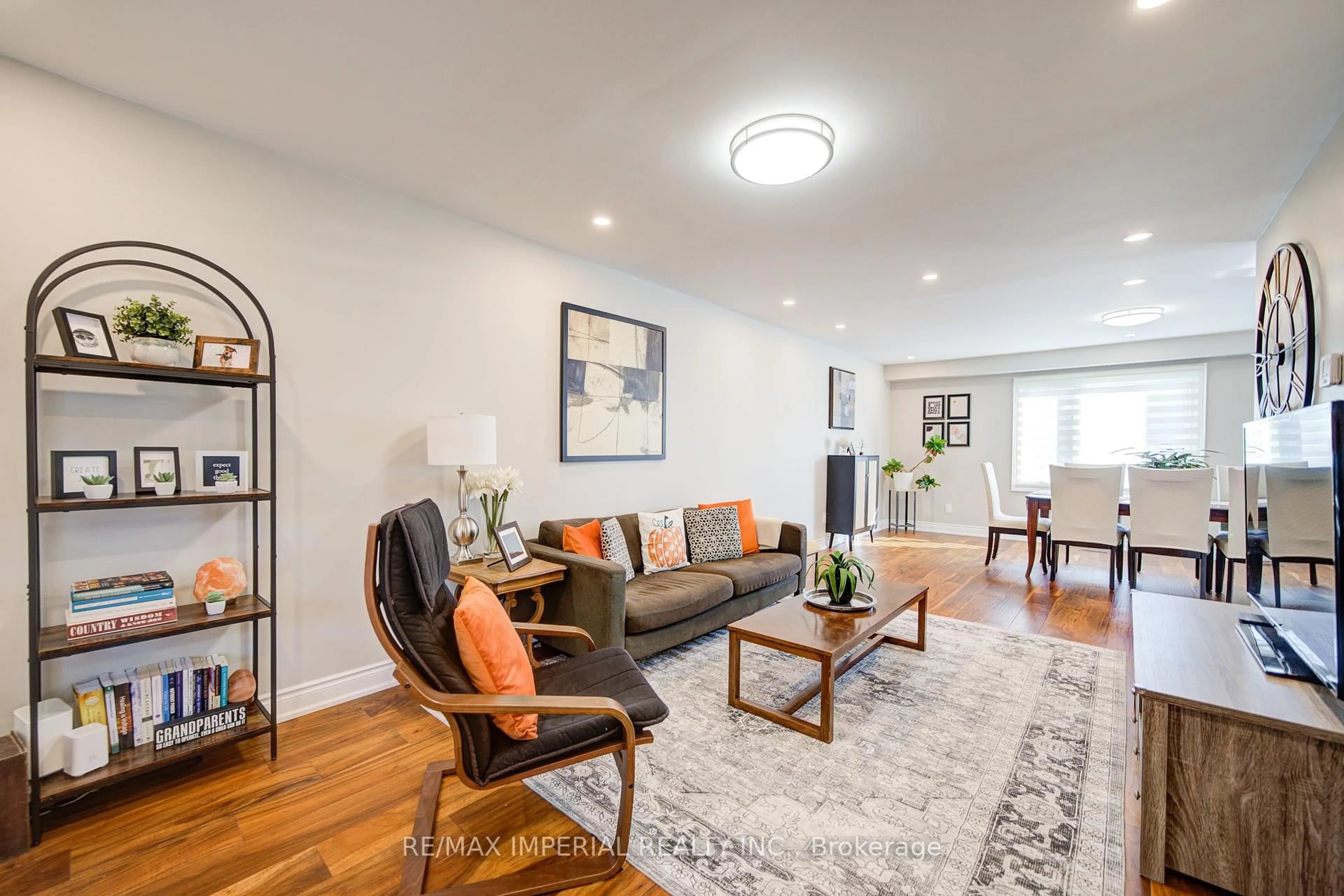 Living room with furniture, wood/laminate floor for 147 Millard St, Whitchurch-Stouffville Ontario L4A 5A1