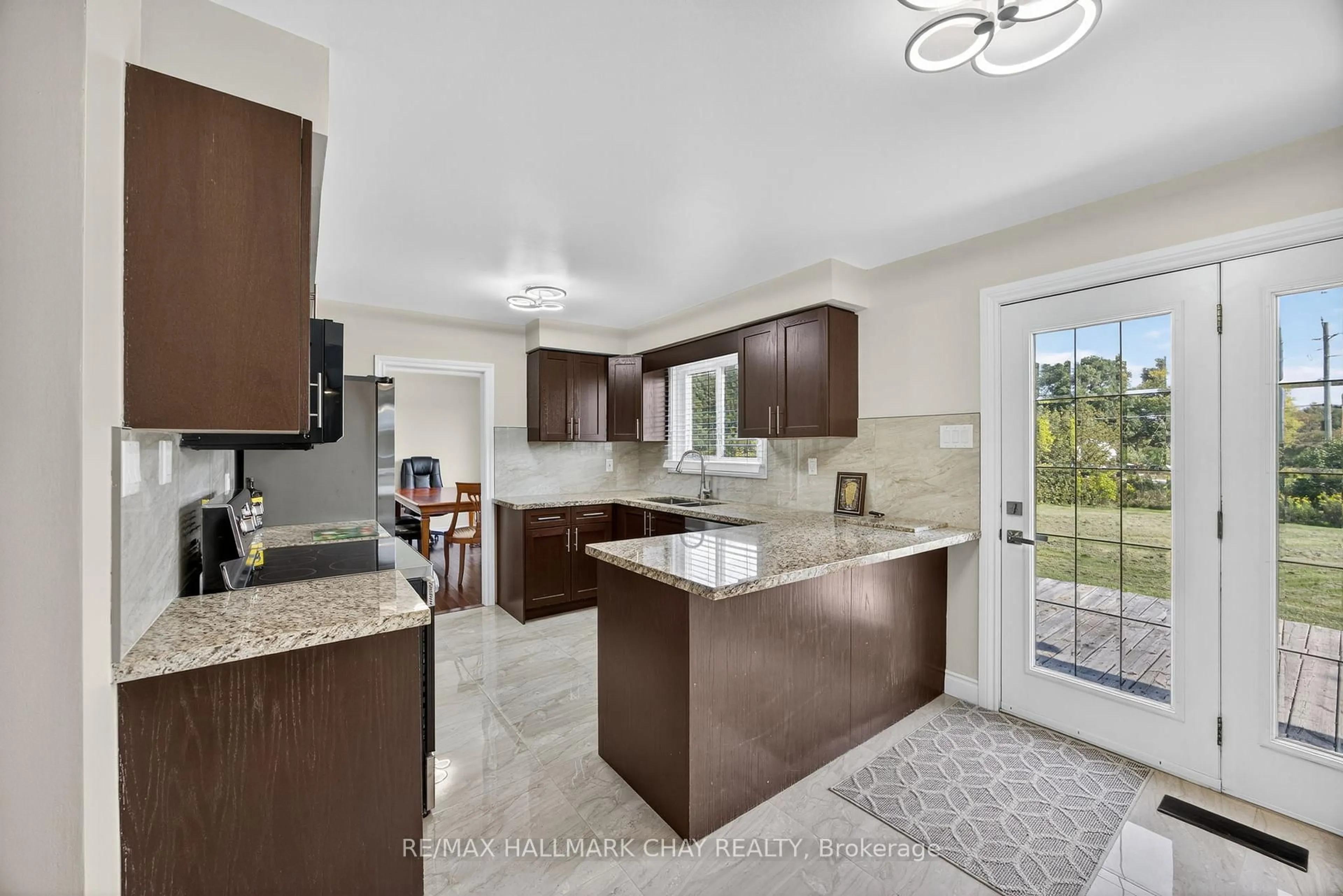 Open concept kitchen, ceramic/tile floor for 3 Simon Dr, Adjala-Tosorontio Ontario L0G 1L0
