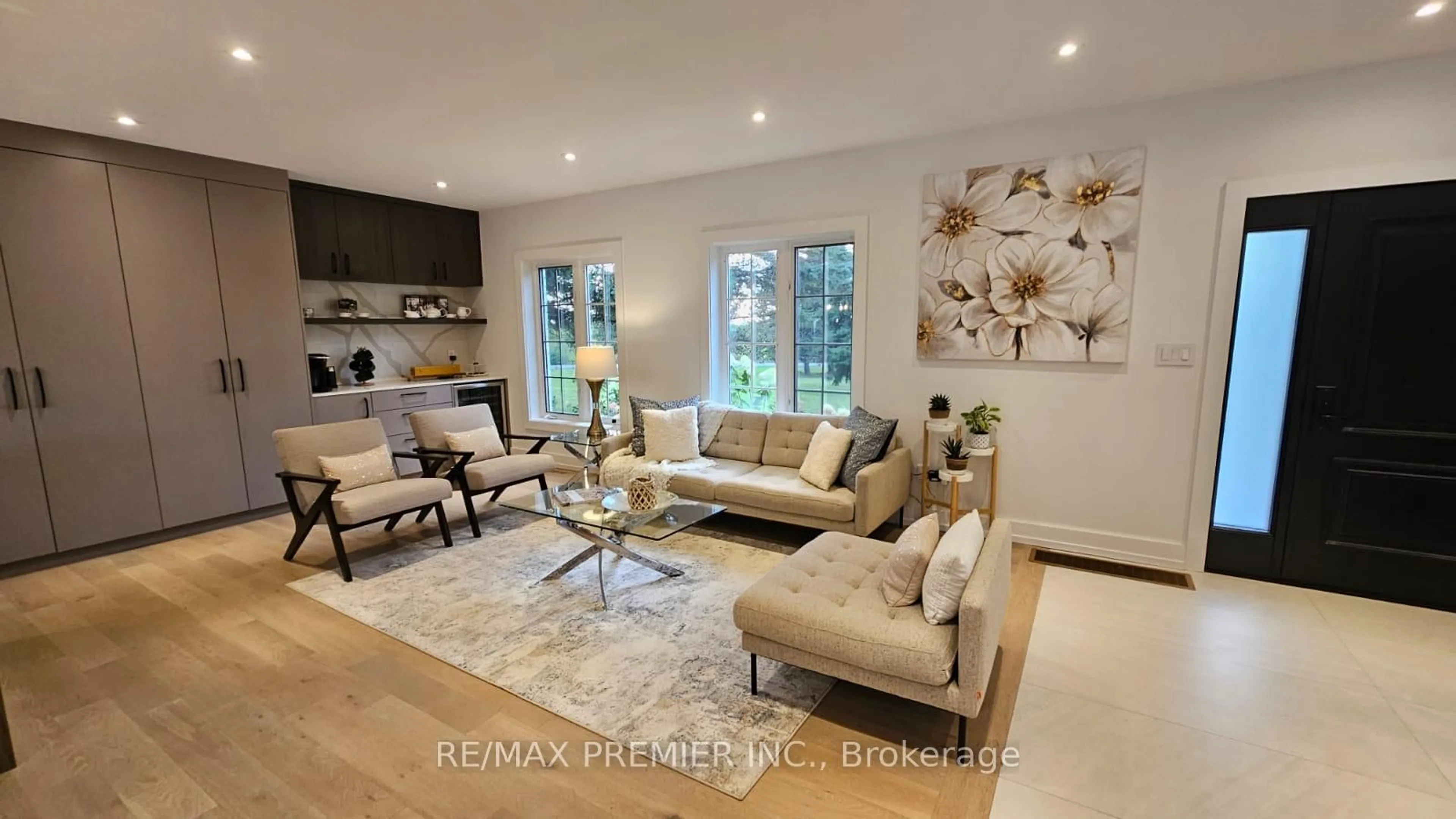 Living room with furniture, wood/laminate floor for 17265 Weston Rd, King Ontario L0G 1J0
