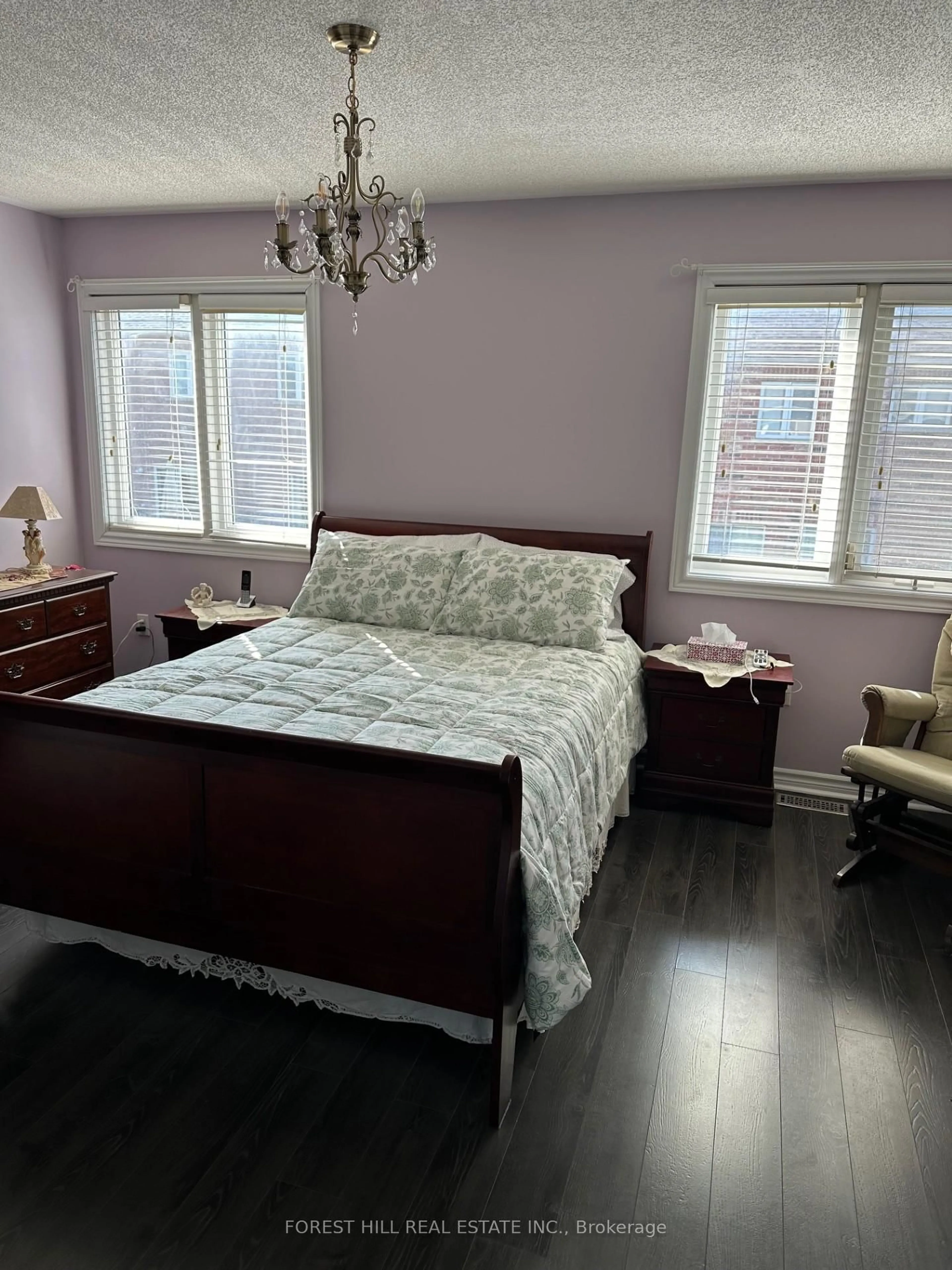 Bedroom with bed, wood/laminate floor for 43 Park Place Dr, Markham Ontario L6E 1Z9