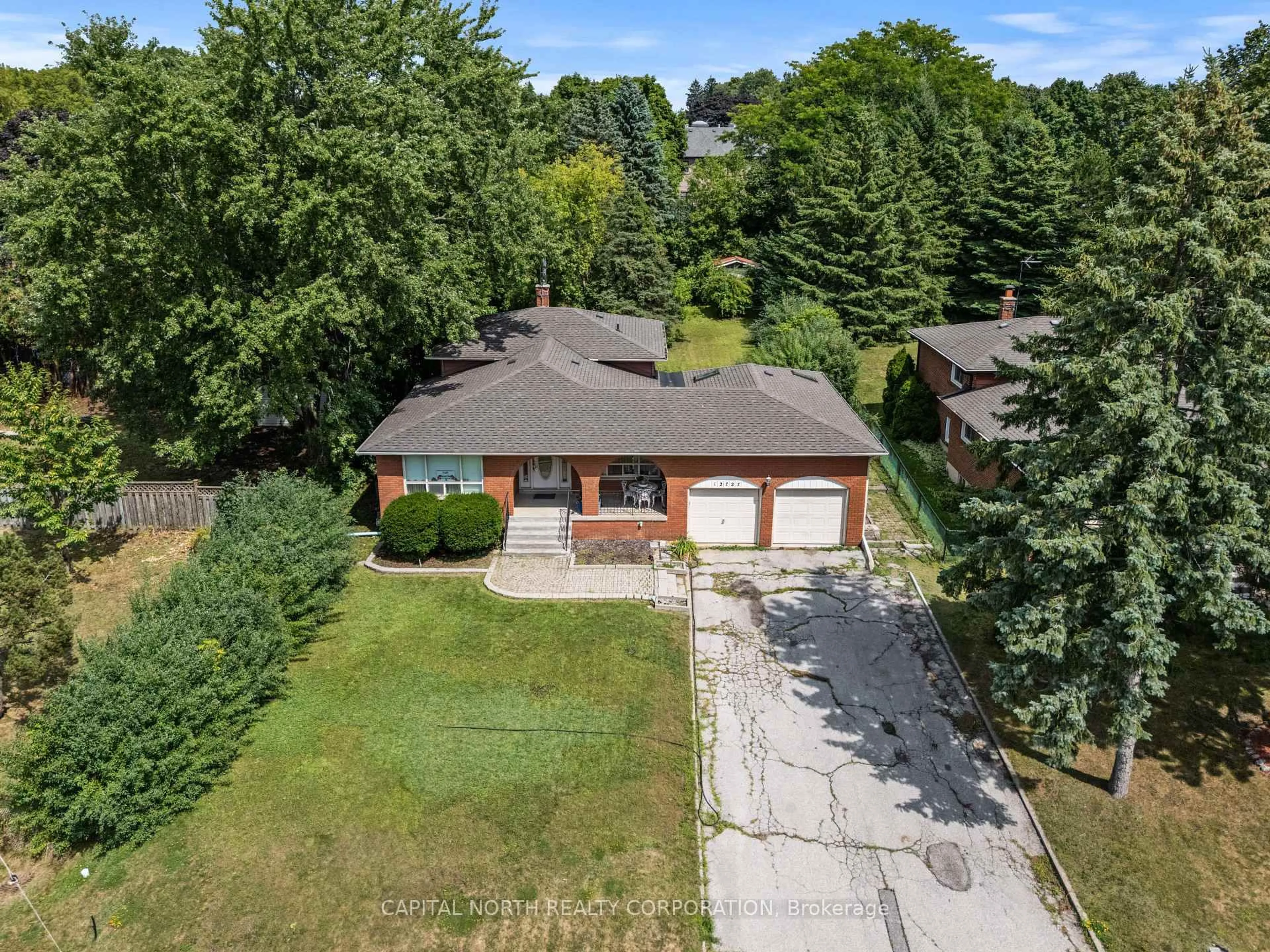 A pic from outside/outdoor area/front of a property/back of a property/a pic from drone, street for 12727 Keele St, King Ontario L7B 1H5