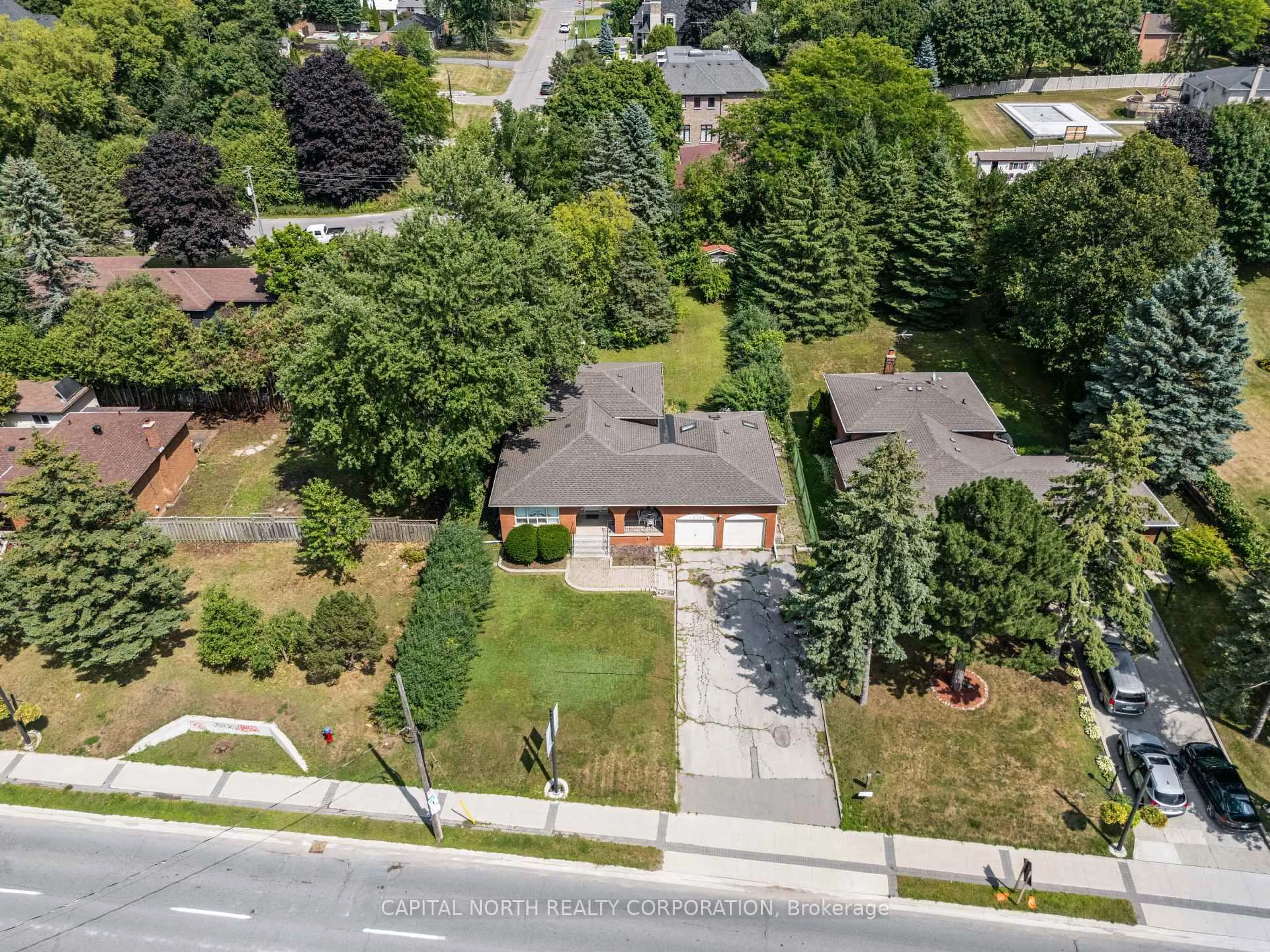 A pic from outside/outdoor area/front of a property/back of a property/a pic from drone, street for 12727 Keele St, King Ontario L7B 1H5