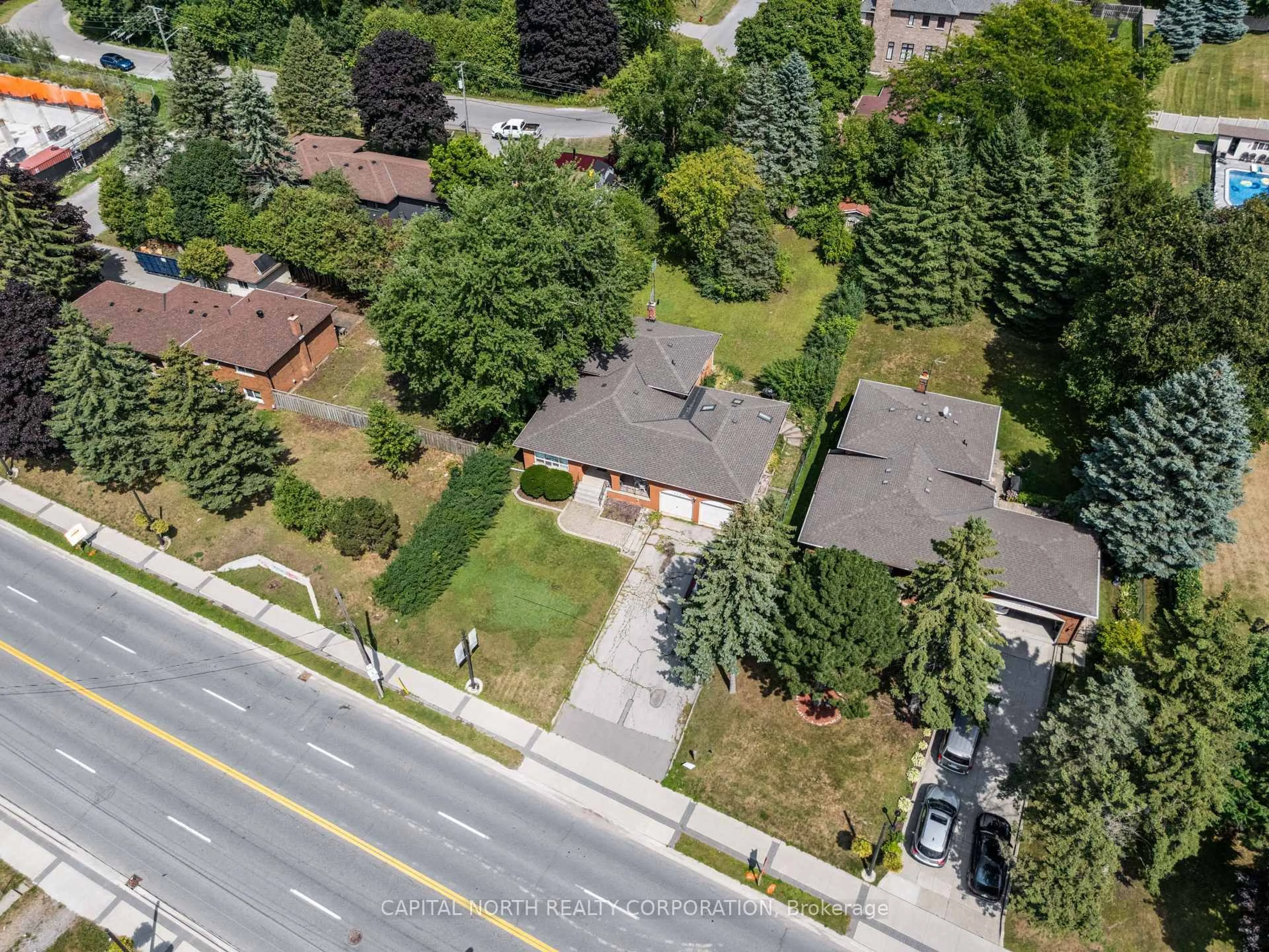 A pic from outside/outdoor area/front of a property/back of a property/a pic from drone, street for 12727 Keele St, King Ontario L7B 1H5