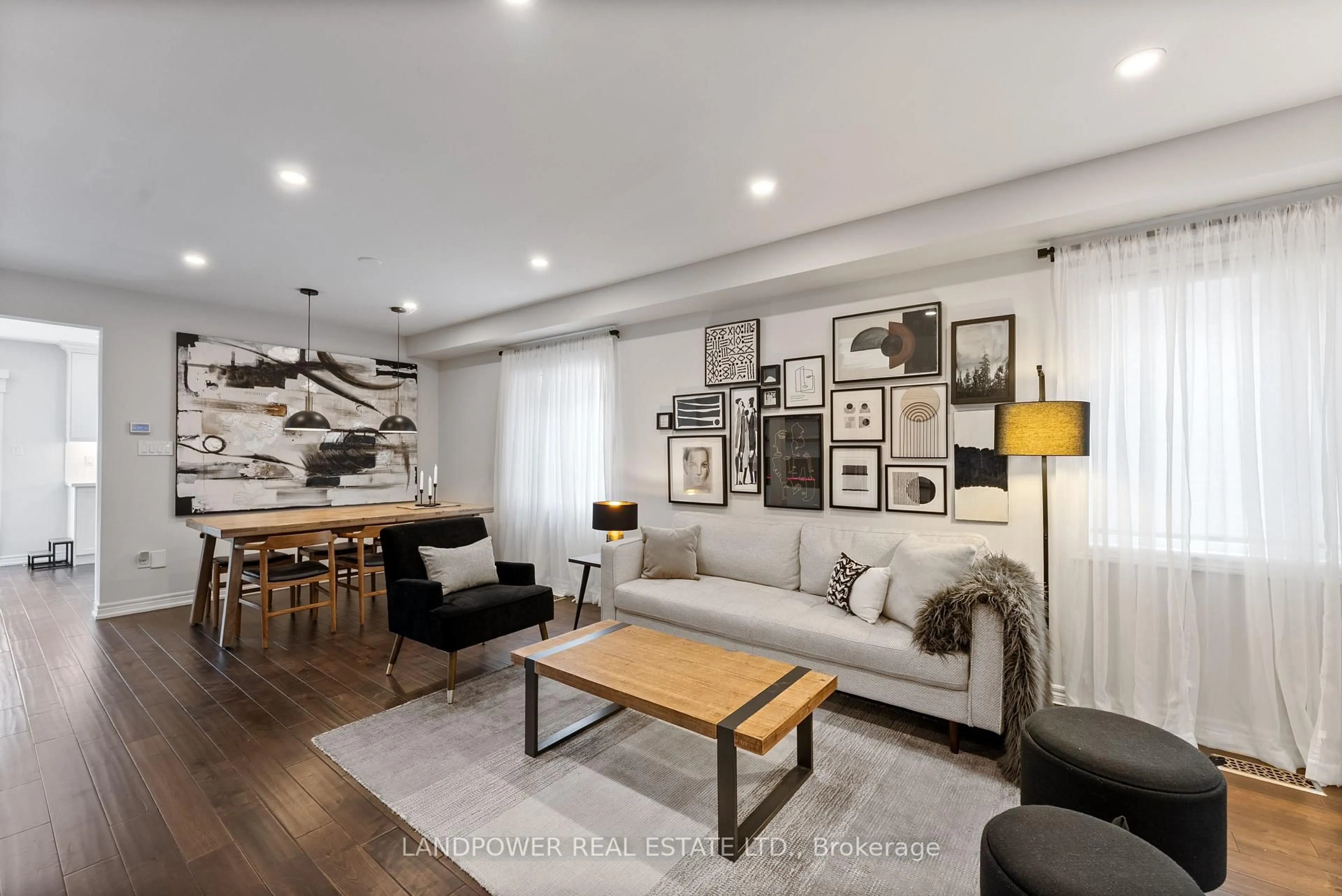 Living room with furniture, wood/laminate floor for 57 Royal Appian Cres, Vaughan Ontario L5K 5L2