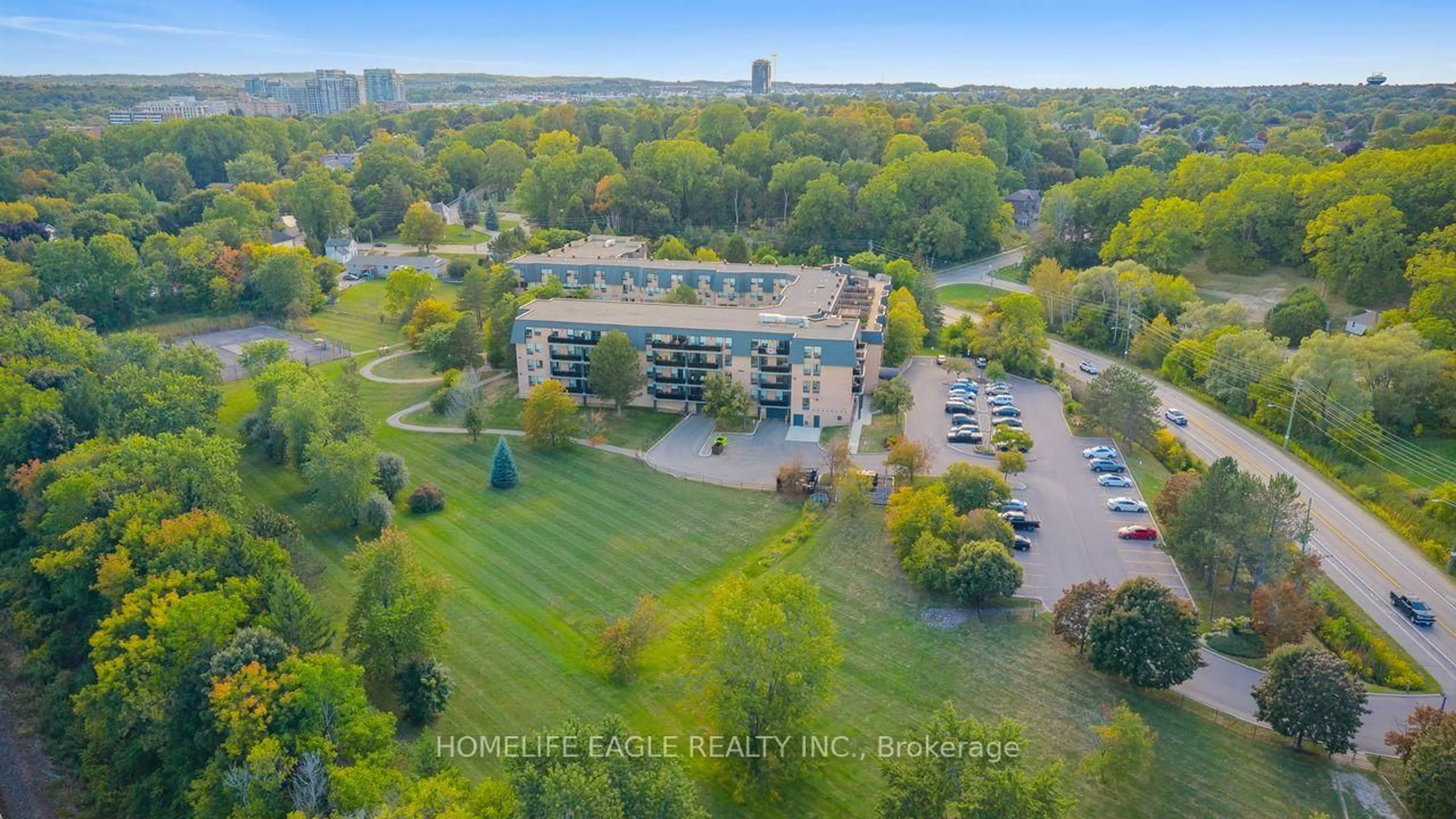 A pic from outside/outdoor area/front of a property/back of a property/a pic from drone, water/lake/river/ocean view for 155 Main St #302, Newmarket Ontario L3Y 8C2