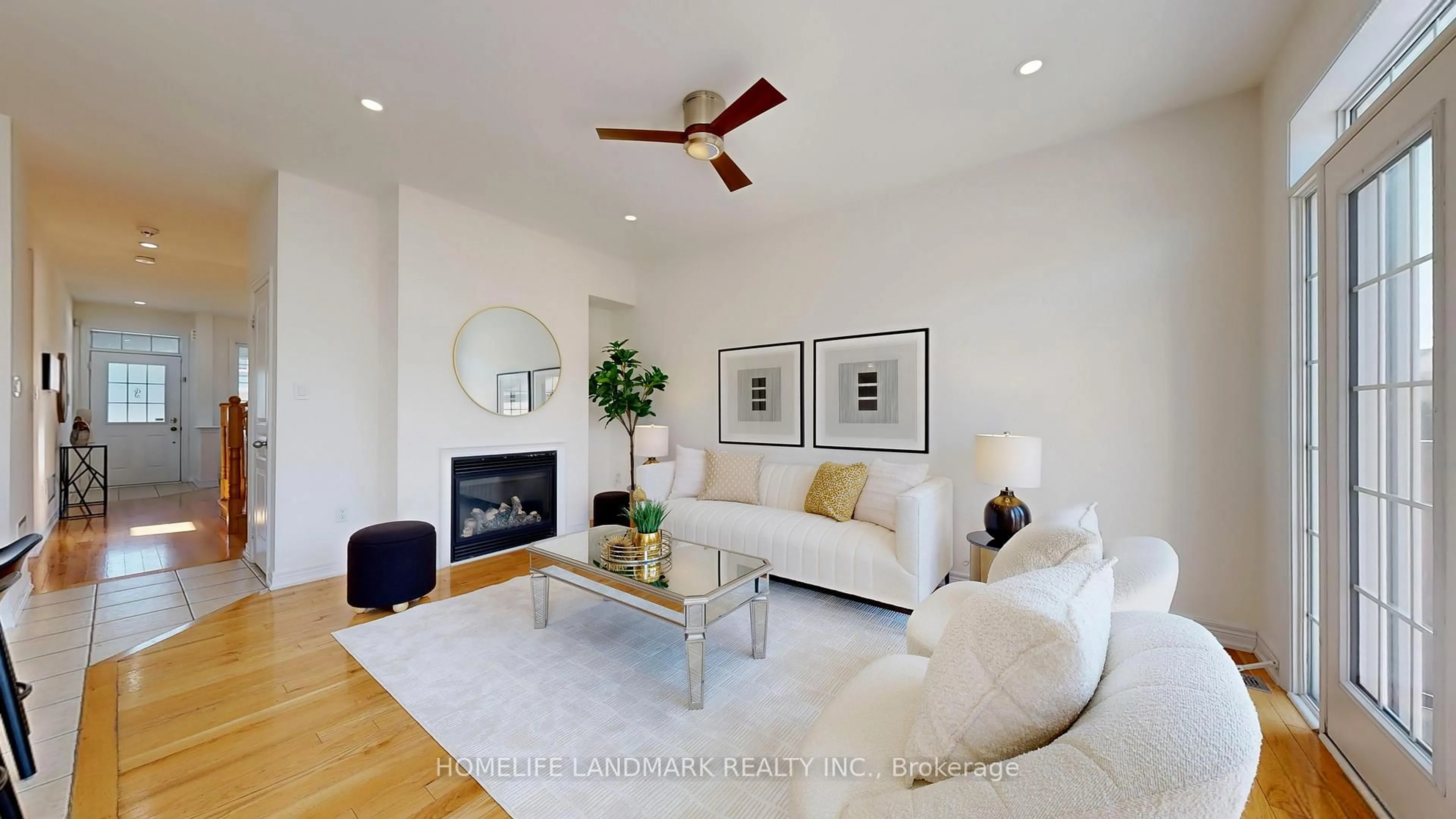 Living room with furniture, wood/laminate floor for 116 Pelee Ave, Vaughan Ontario L4H 3Z2
