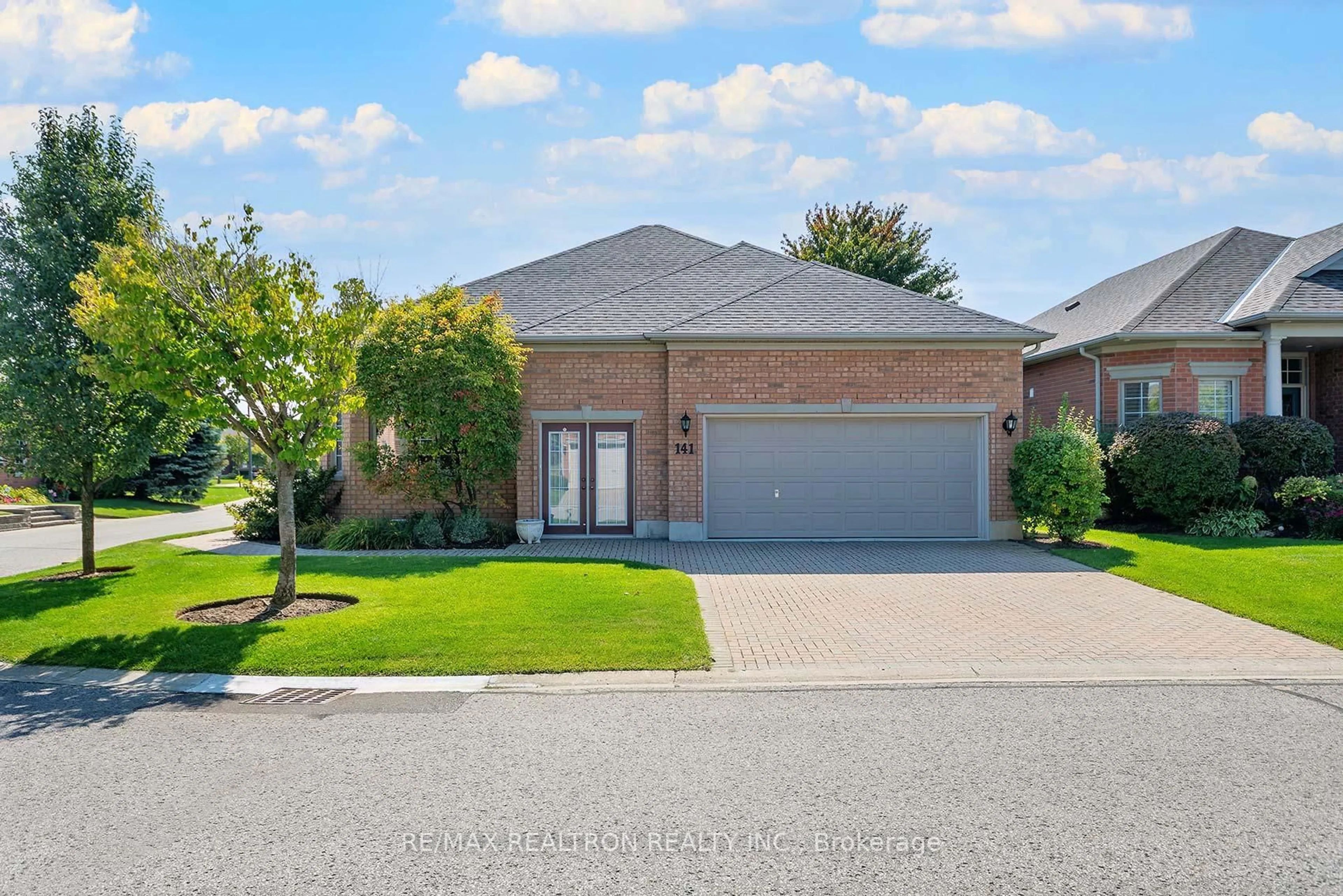Home with brick exterior material, street for 141 Bobby Locke Lane, Whitchurch-Stouffville Ontario L4A 1R3