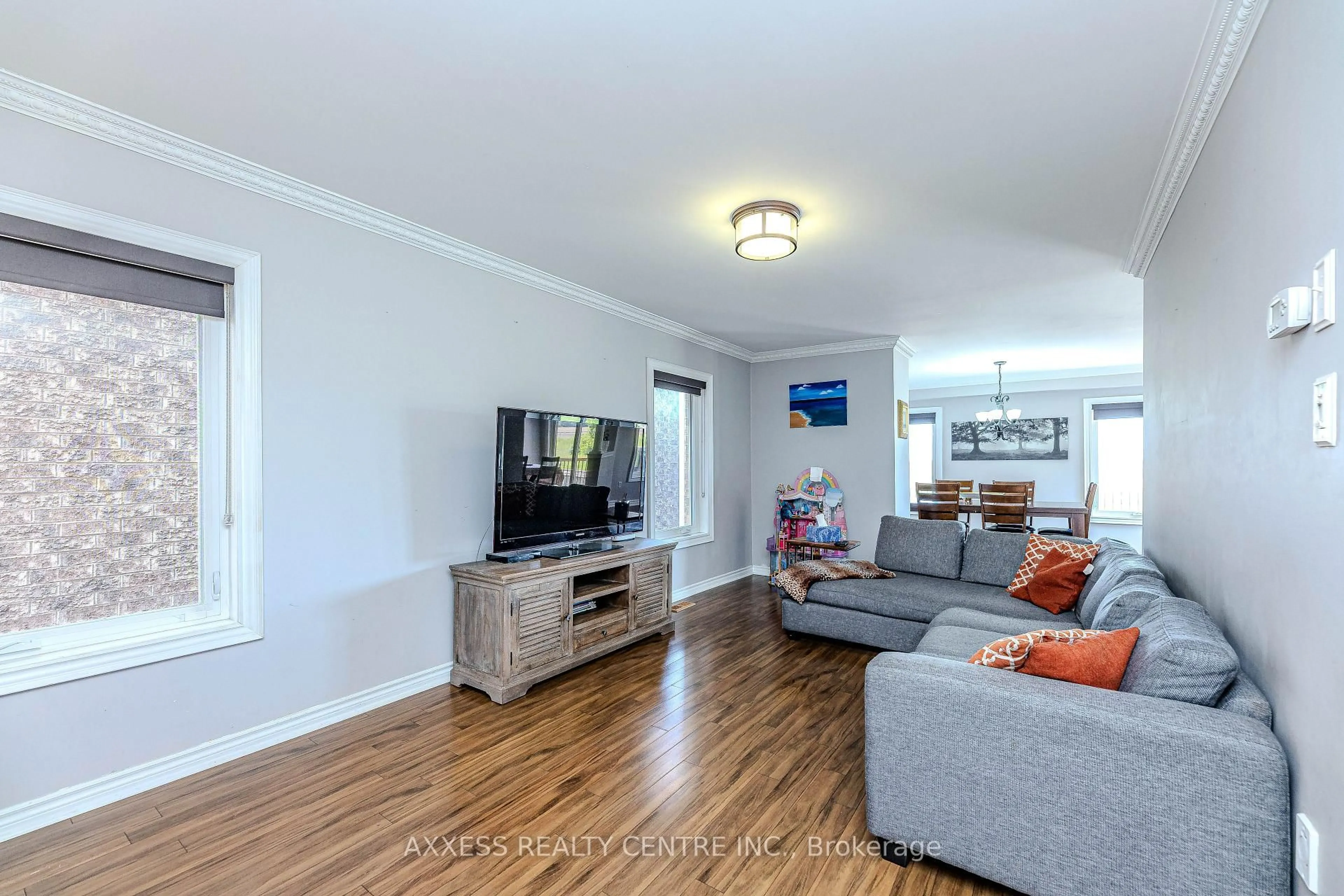 Living room with furniture, wood/laminate floor for 72 Beaverbrook Cres, Vaughan Ontario L6A 3T3