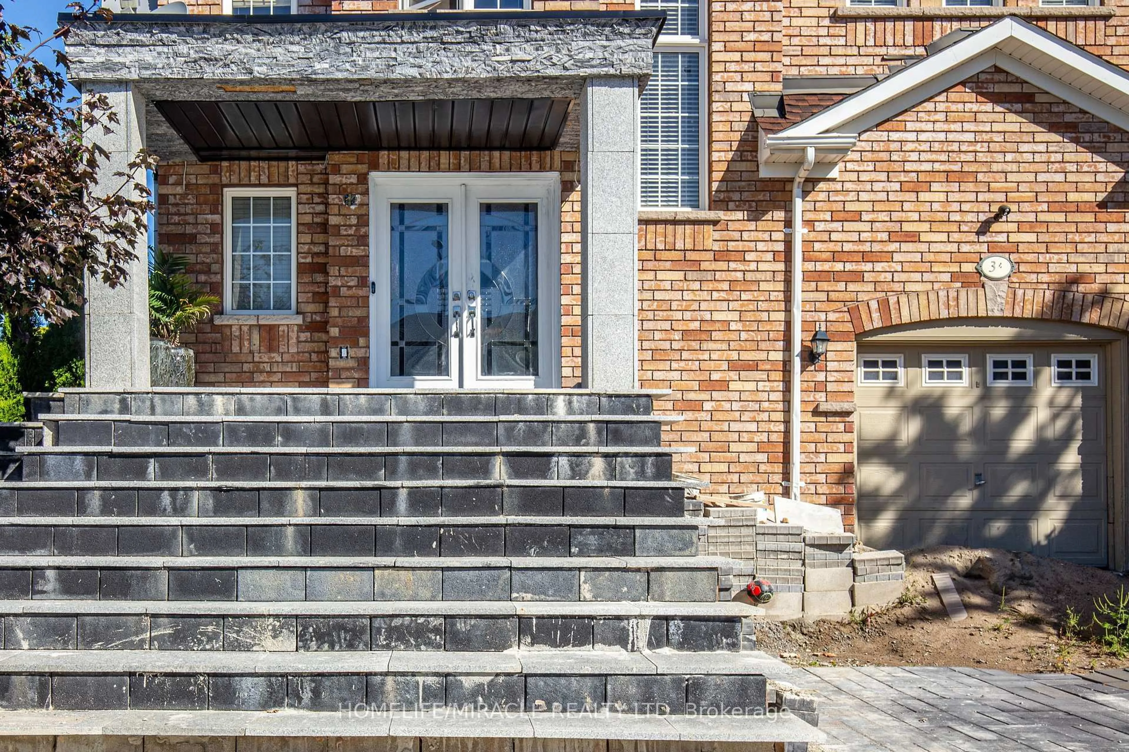 Home with brick exterior material, street for 34 Bottero Dr, Vaughan Ontario L6A 3V2