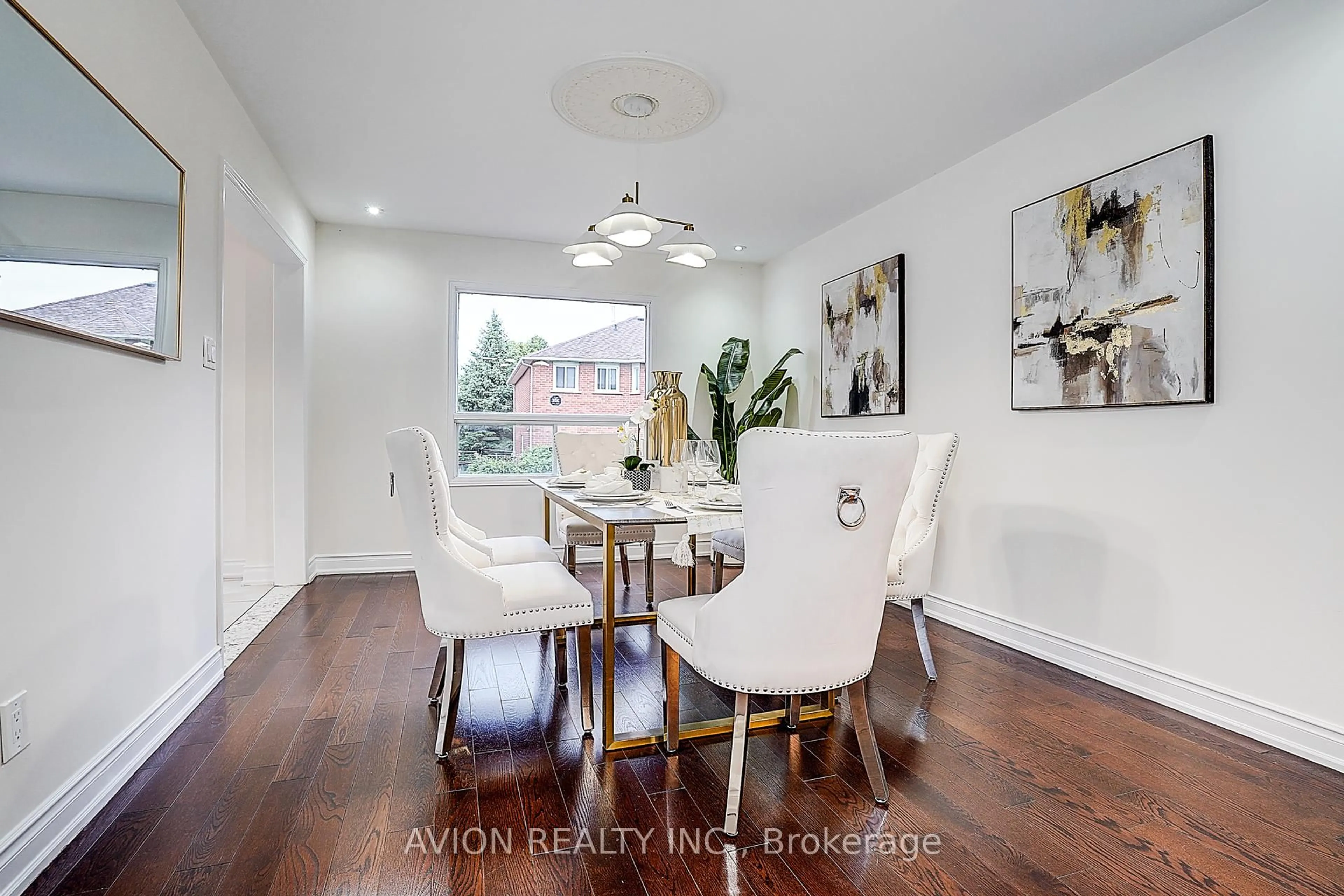 Dining room, wood/laminate floor for 119 Mary Pearson Dr, Markham Ontario L3S 3E9