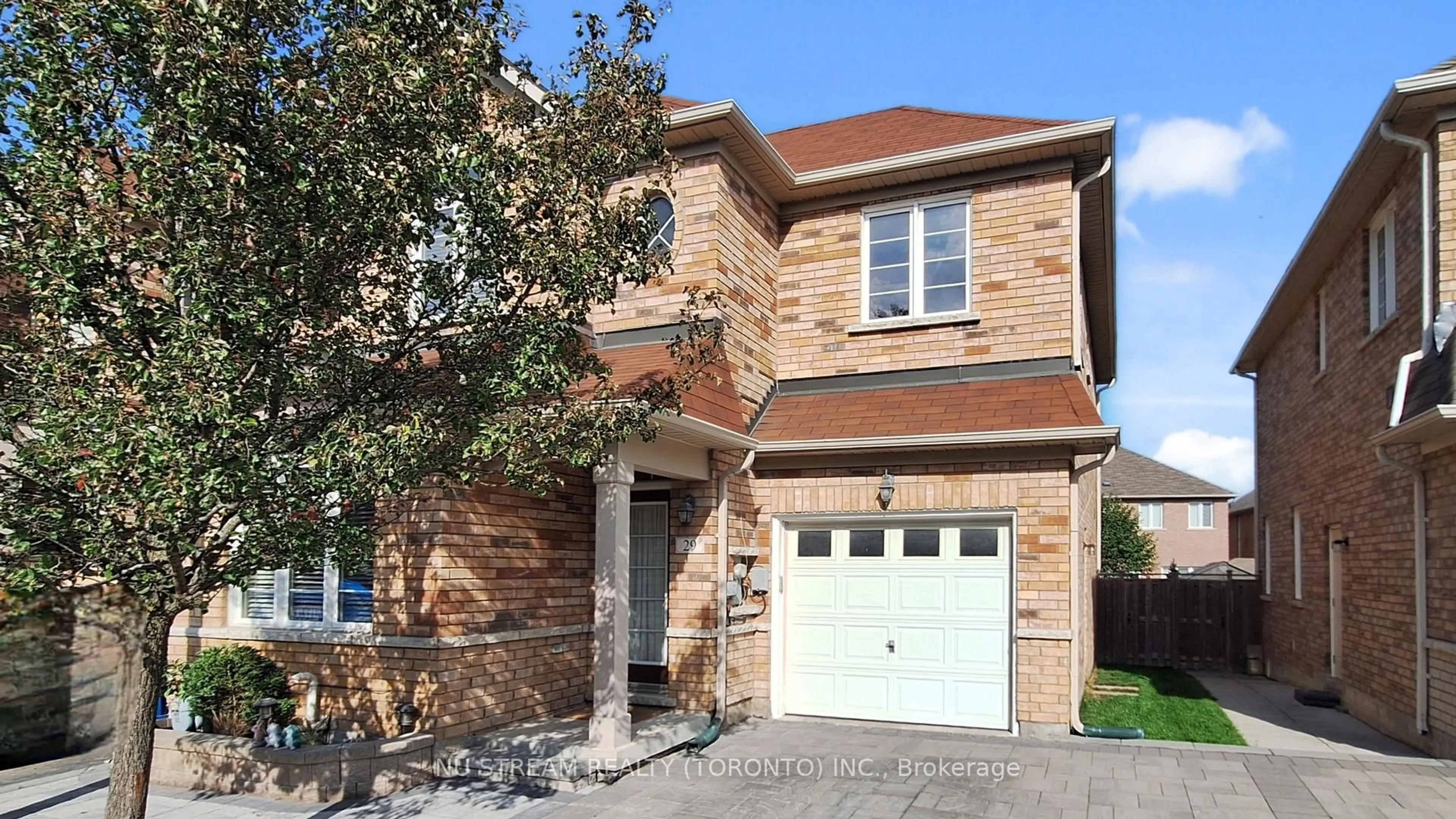 Home with brick exterior material, street for 29 Todman Lane, Markham Ontario L6E 0C8