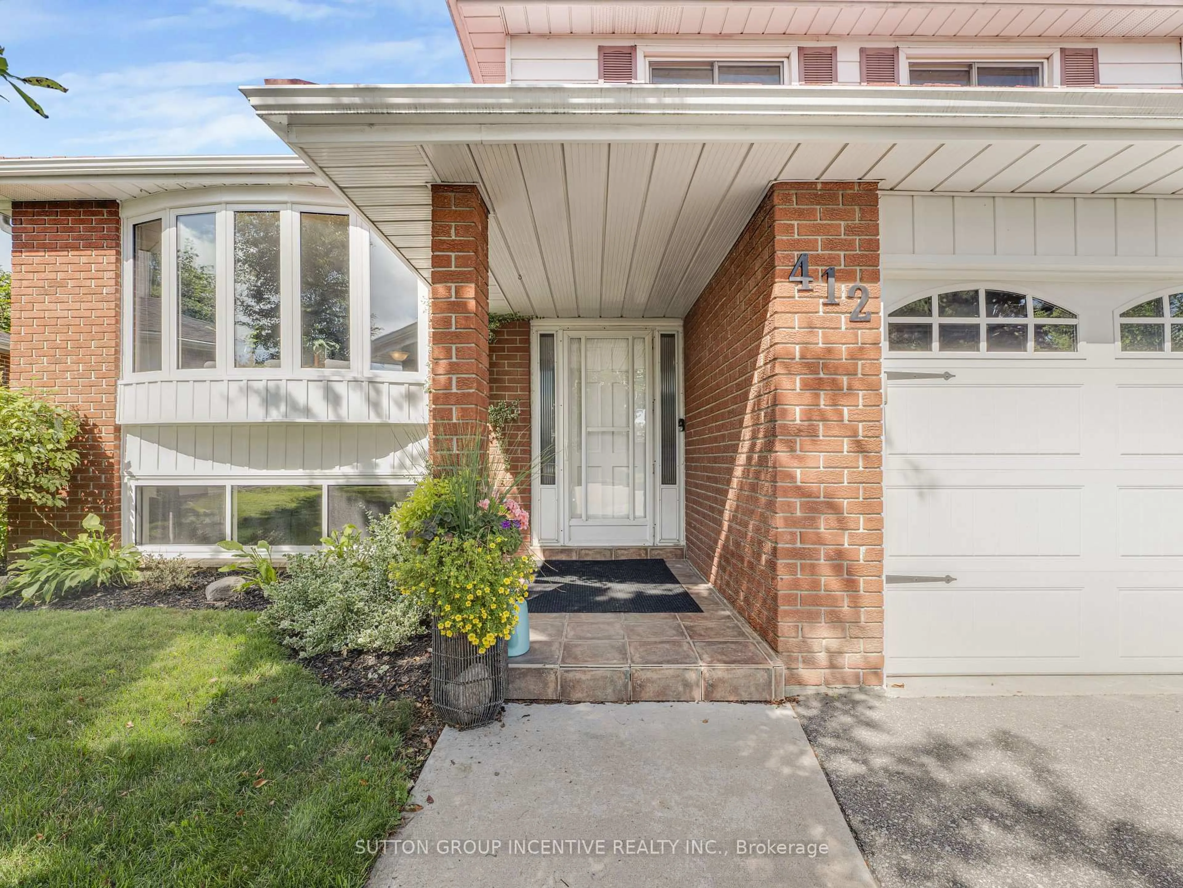 Home with brick exterior material, street for 412 Orsi Ave, Bradford West Gwillimbury Ontario L3Z 1B9