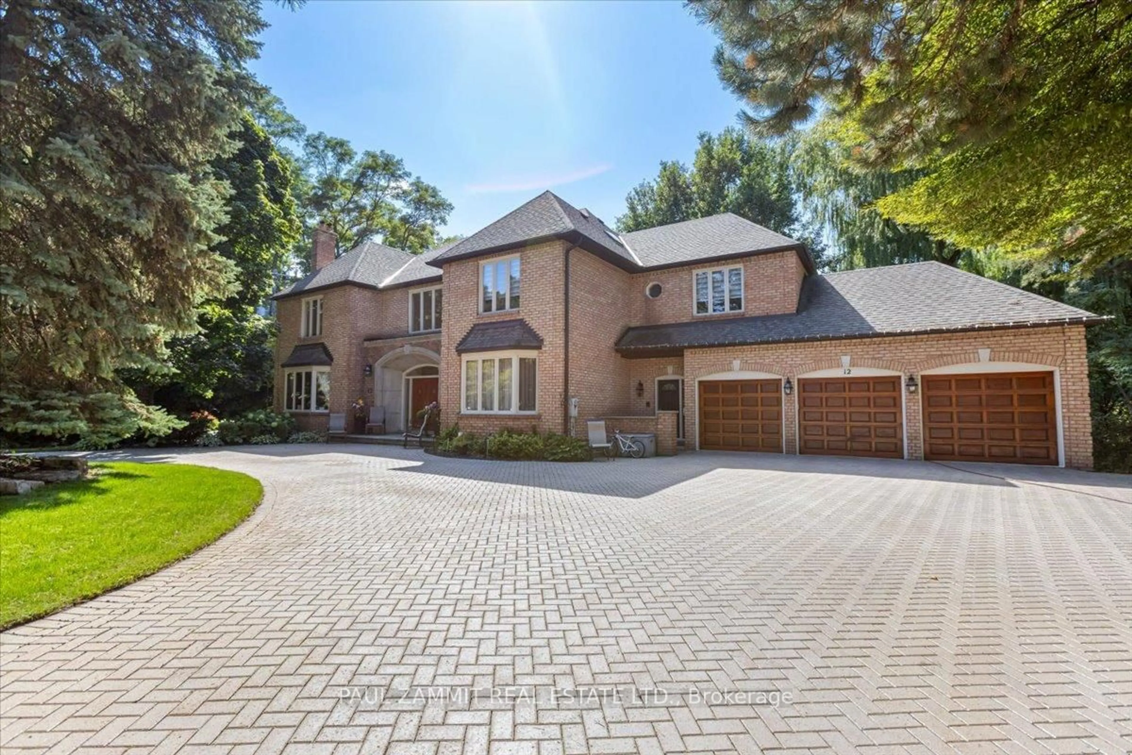 Home with brick exterior material, street for 12 Old English Lane, Markham Ontario L3T 2T9
