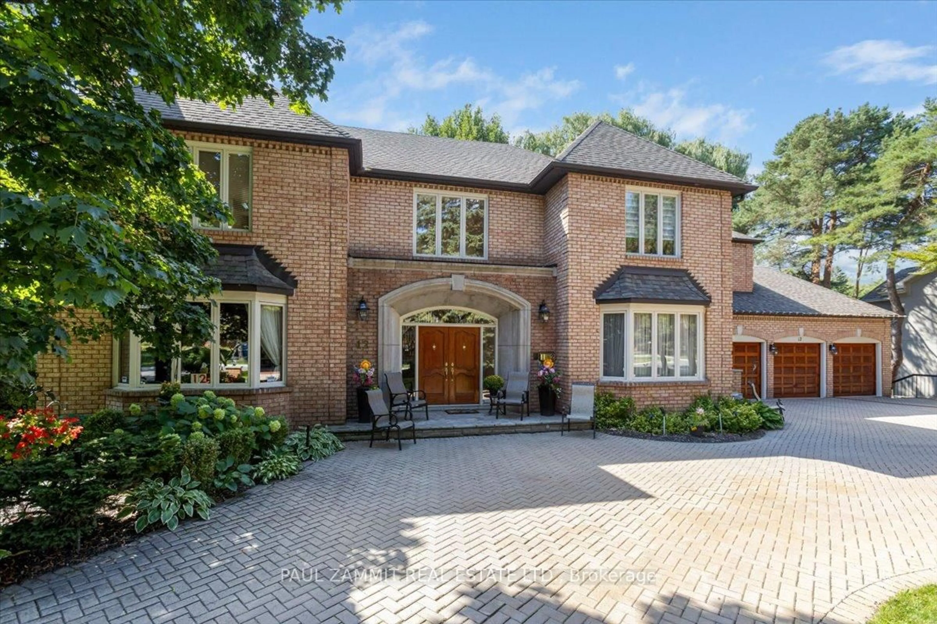 Home with brick exterior material, street for 12 Old English Lane, Markham Ontario L3T 2T9
