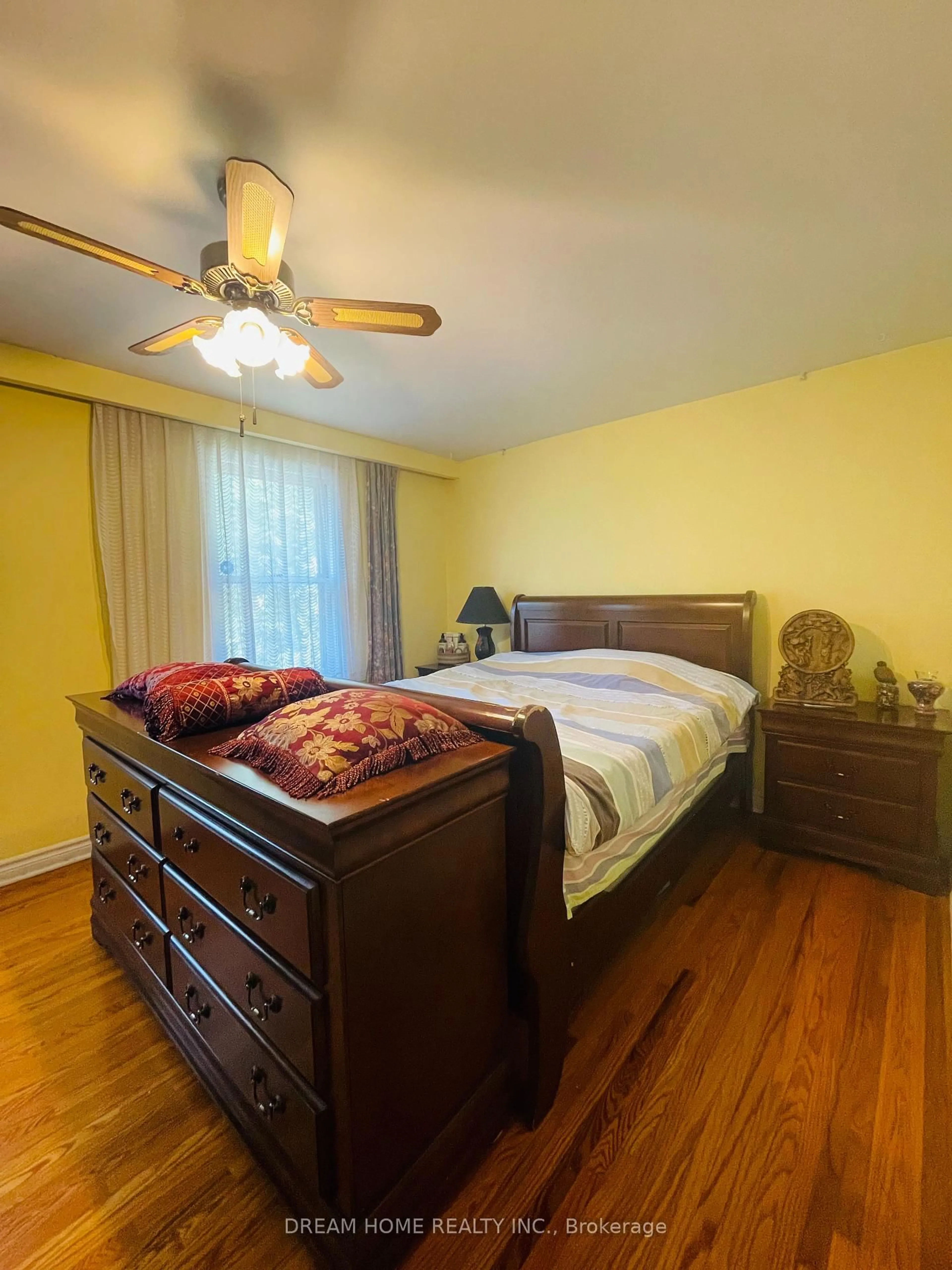 Bedroom with bed, wood/laminate floor for 93 Babcombe Dr, Markham Ontario L3T 1M9