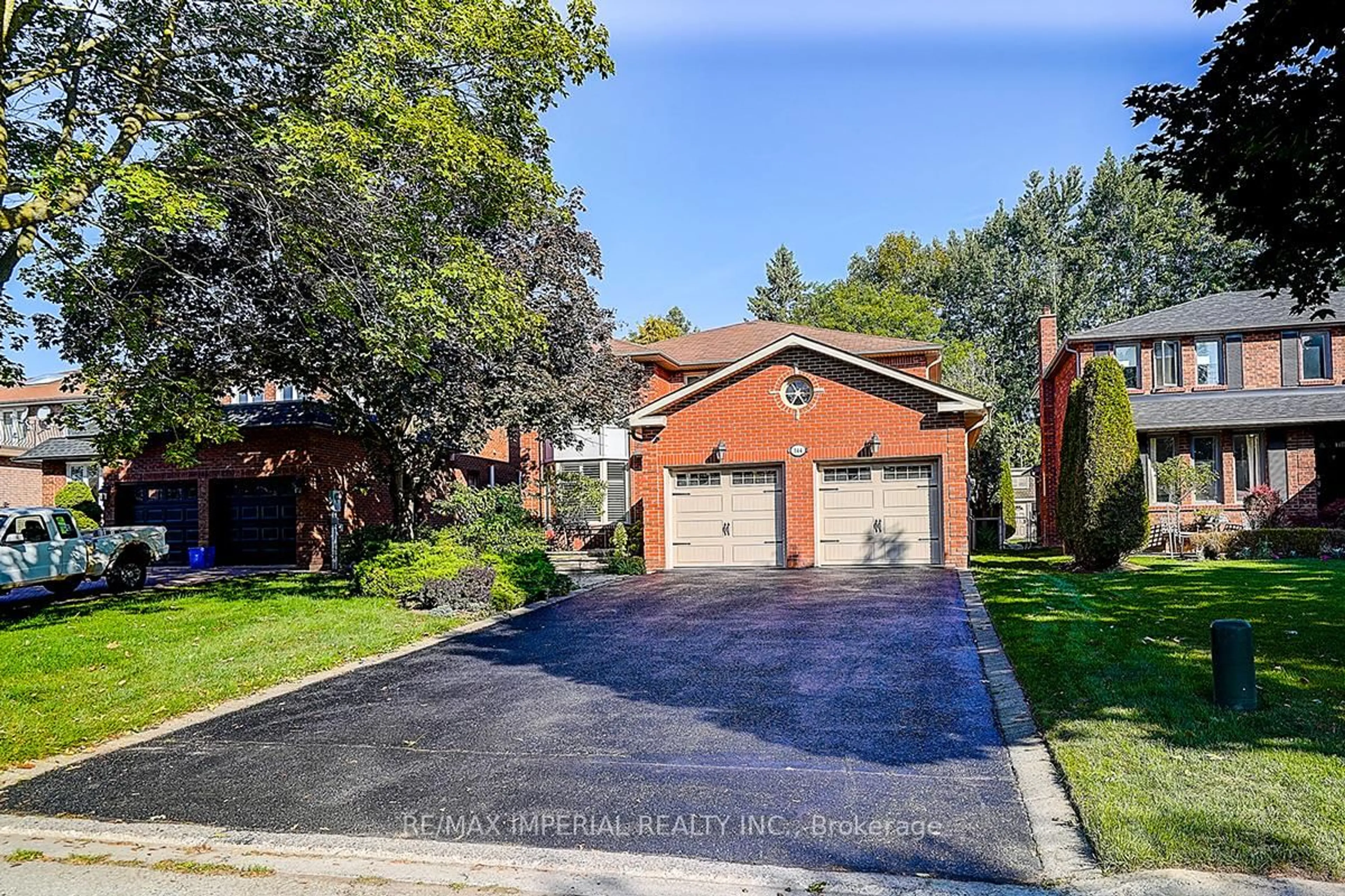 Home with brick exterior material, street for 144 Marsi Rd, Richmond Hill Ontario L4C 5S8