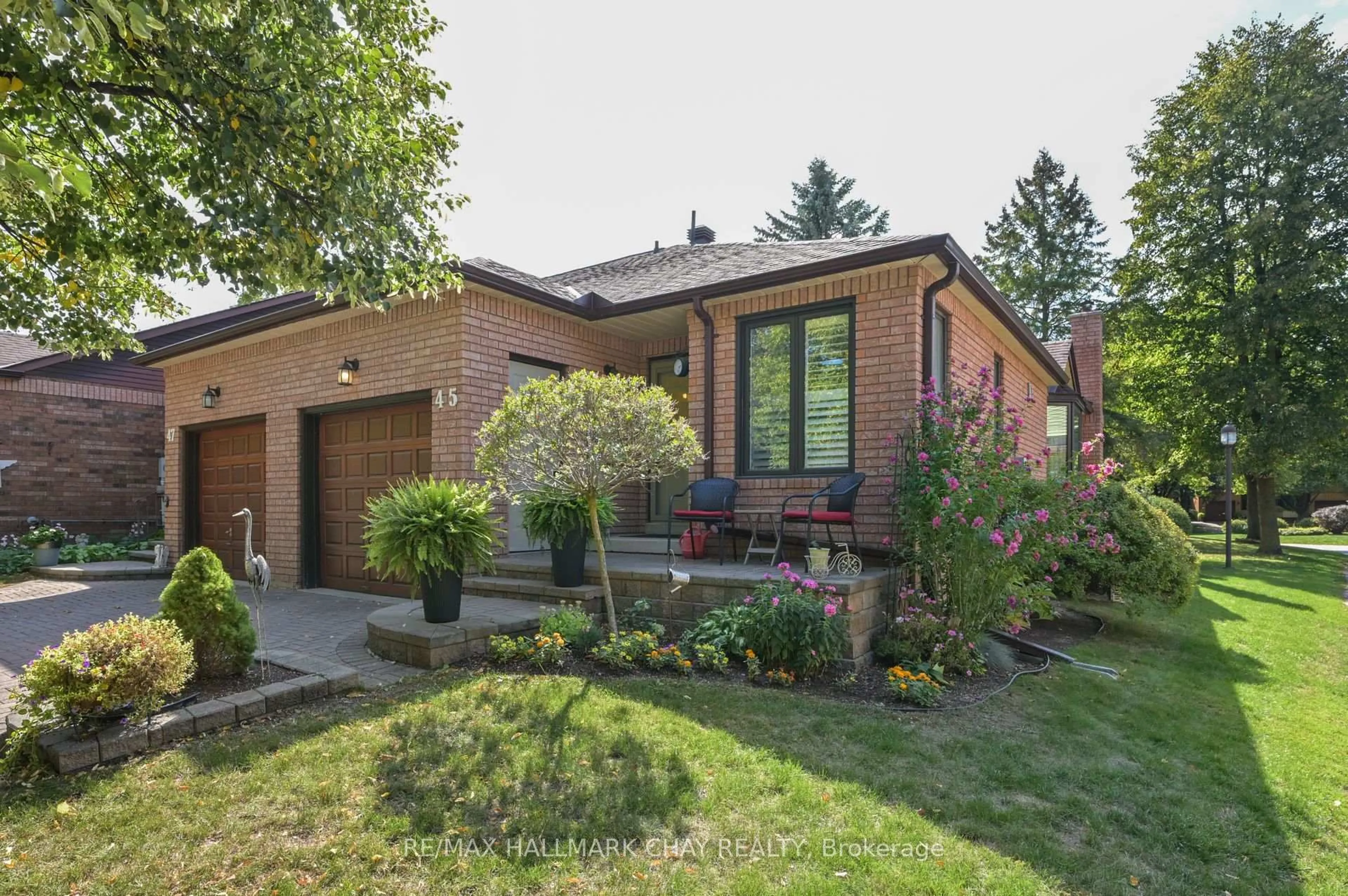 Home with brick exterior material, street for 45 Green Briar Rd, New Tecumseth Ontario L9R 1R6