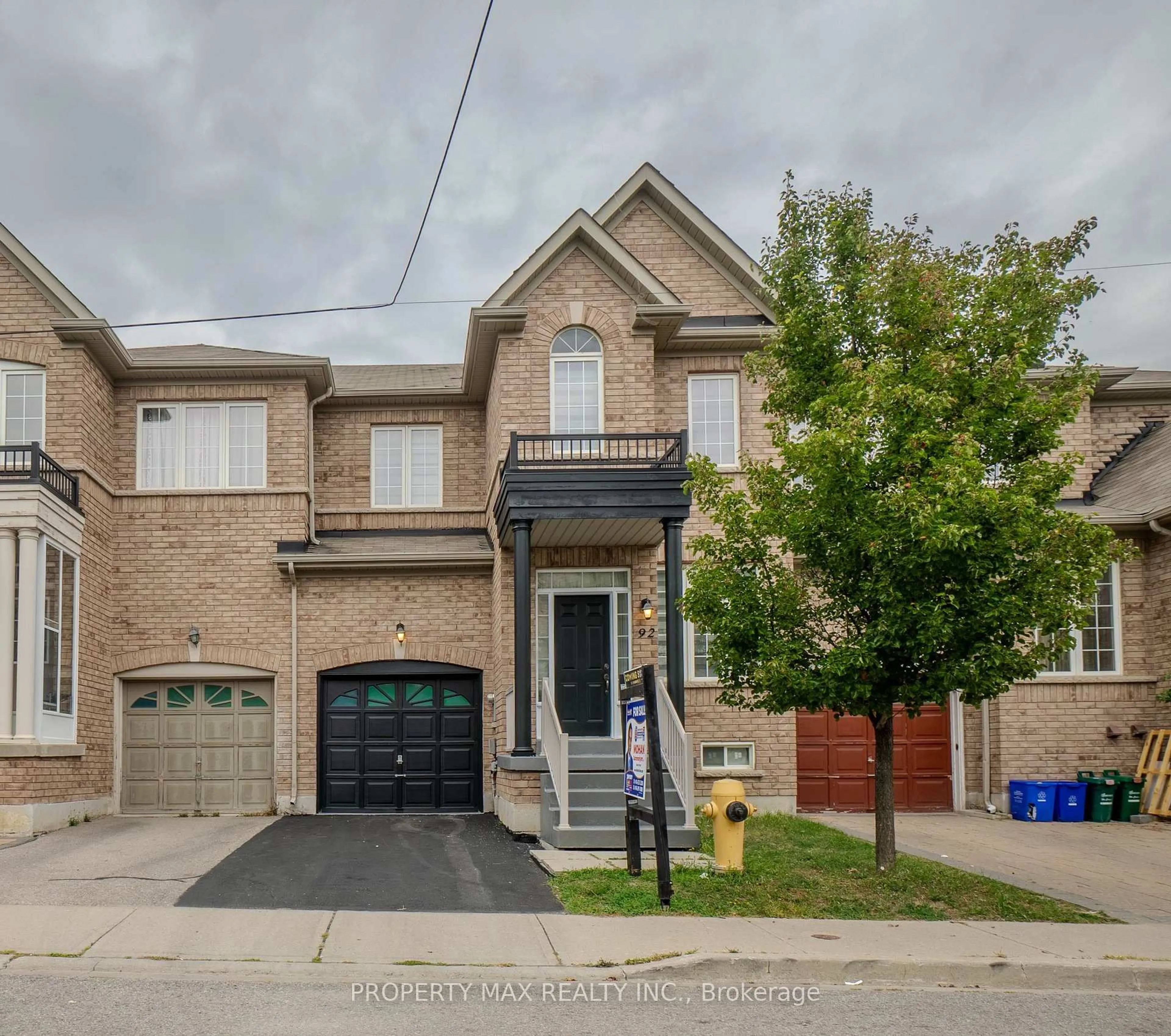 Home with brick exterior material, street for 92 Coleluke Lane, Markham Ontario L3S 0B7