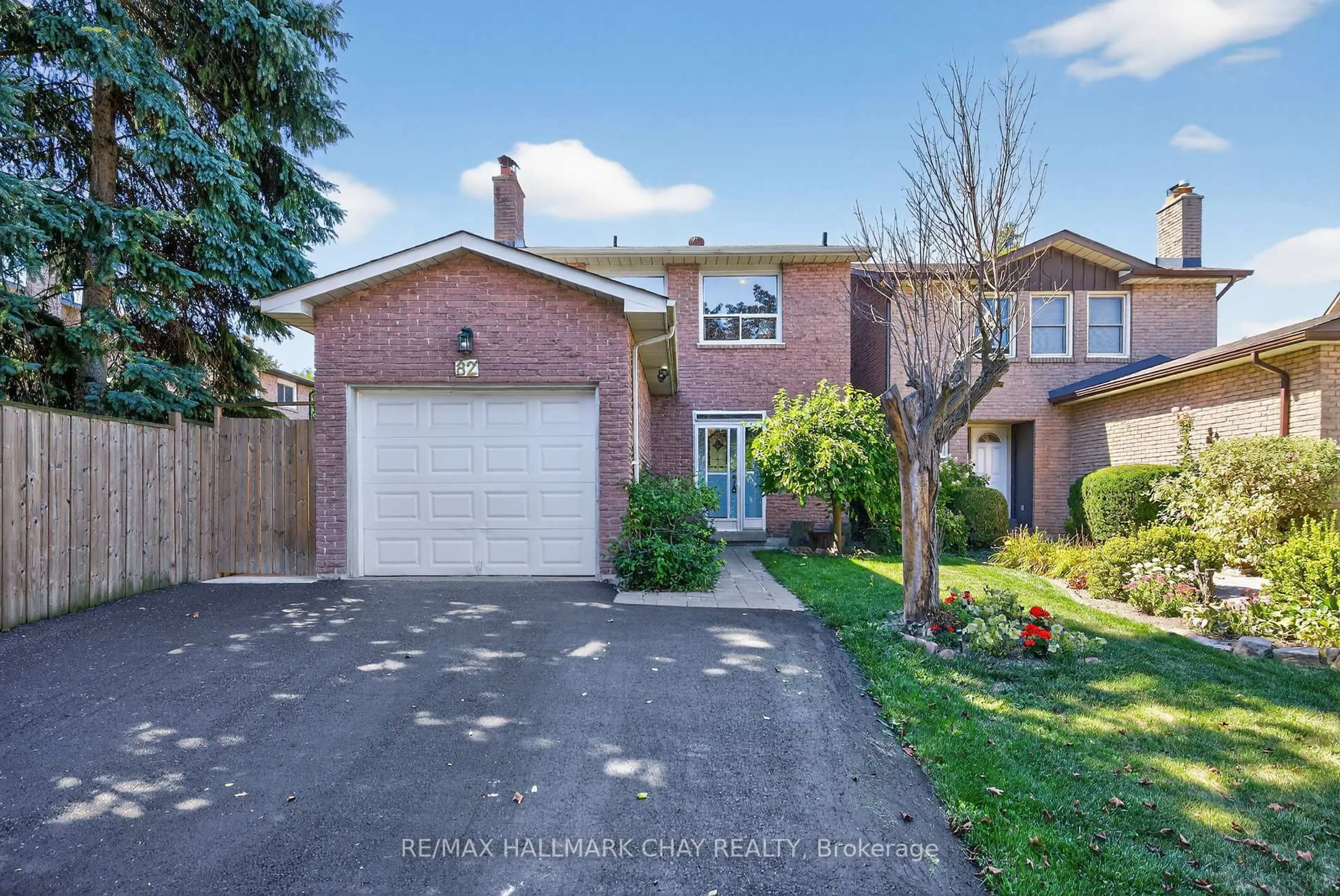 Home with brick exterior material, street for 82 Lilac Ave, Markham Ontario L3T 5K2