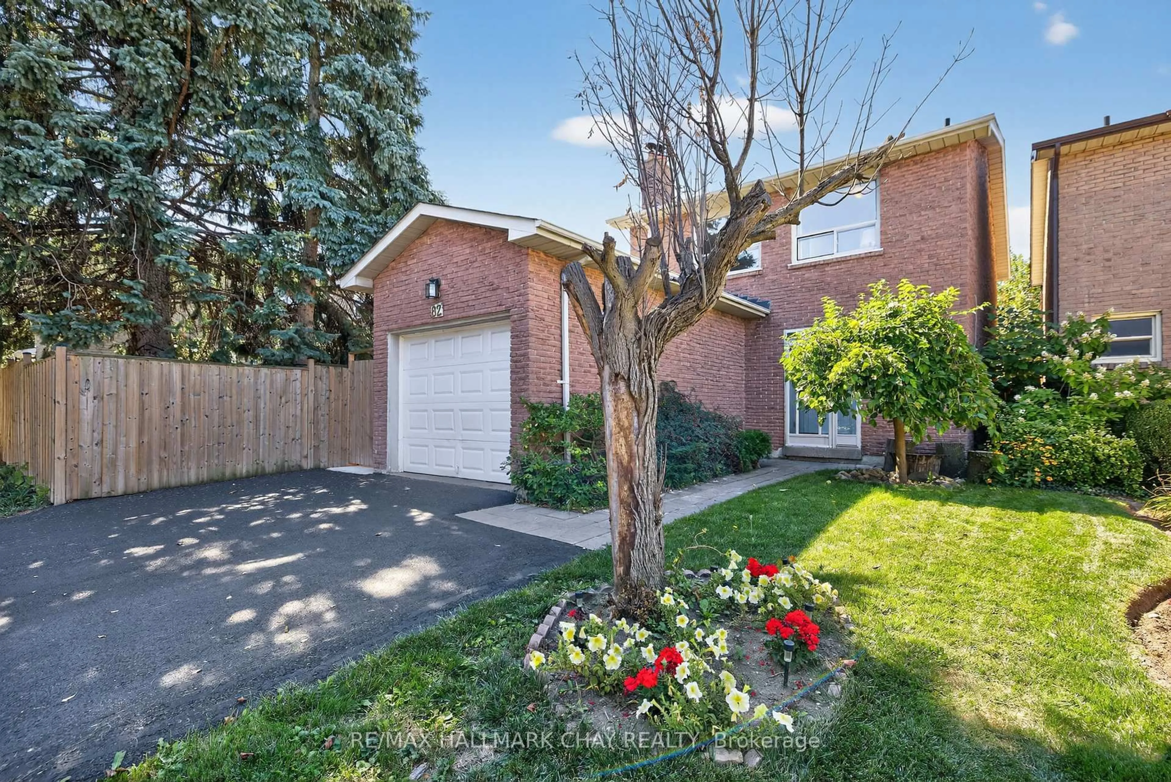Home with brick exterior material, street for 82 Lilac Ave, Markham Ontario L3T 5K2
