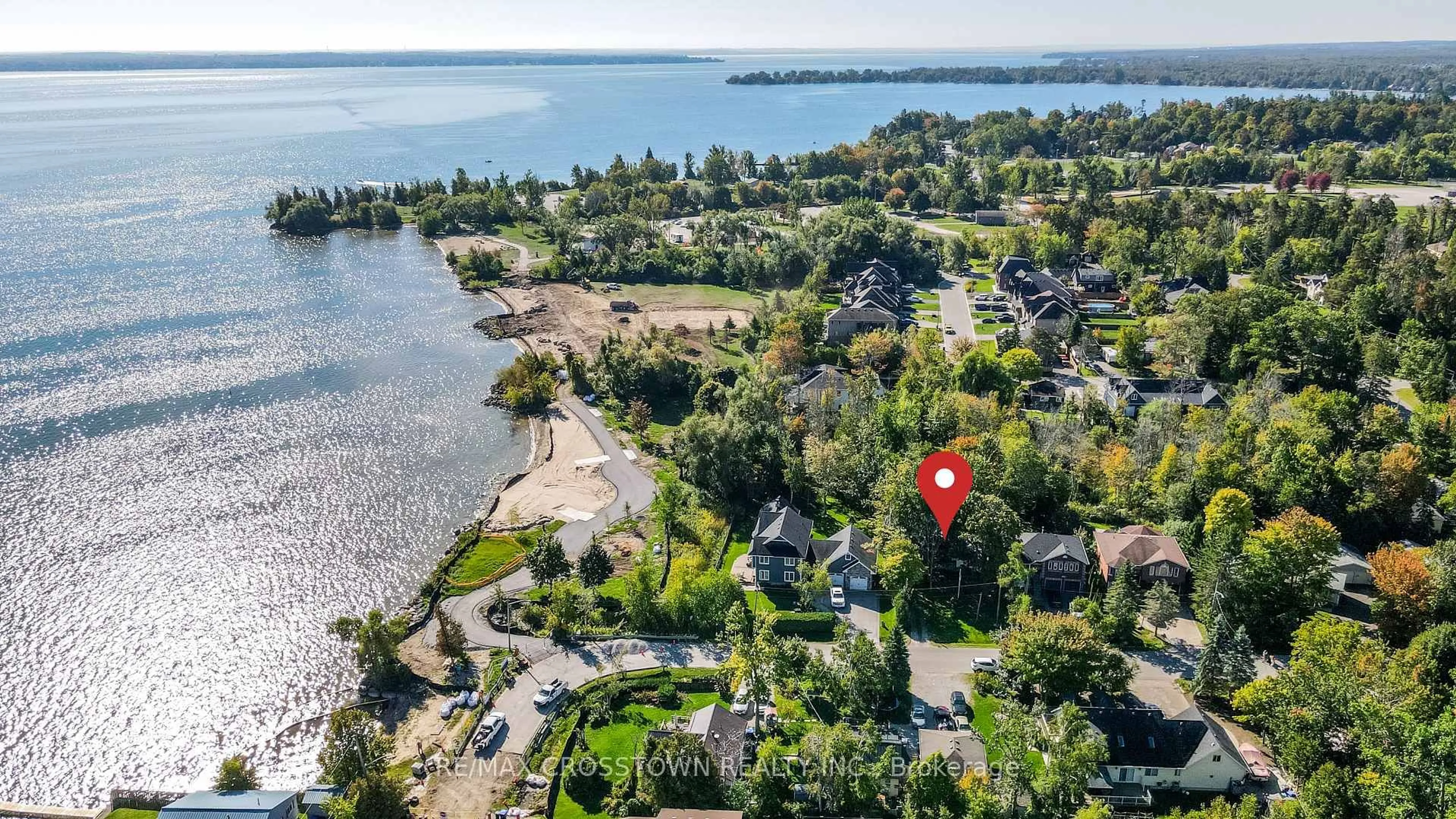 A pic from outside/outdoor area/front of a property/back of a property/a pic from drone, water/lake/river/ocean view for 673 Roberts Rd, Innisfil Ontario L9S 2E3