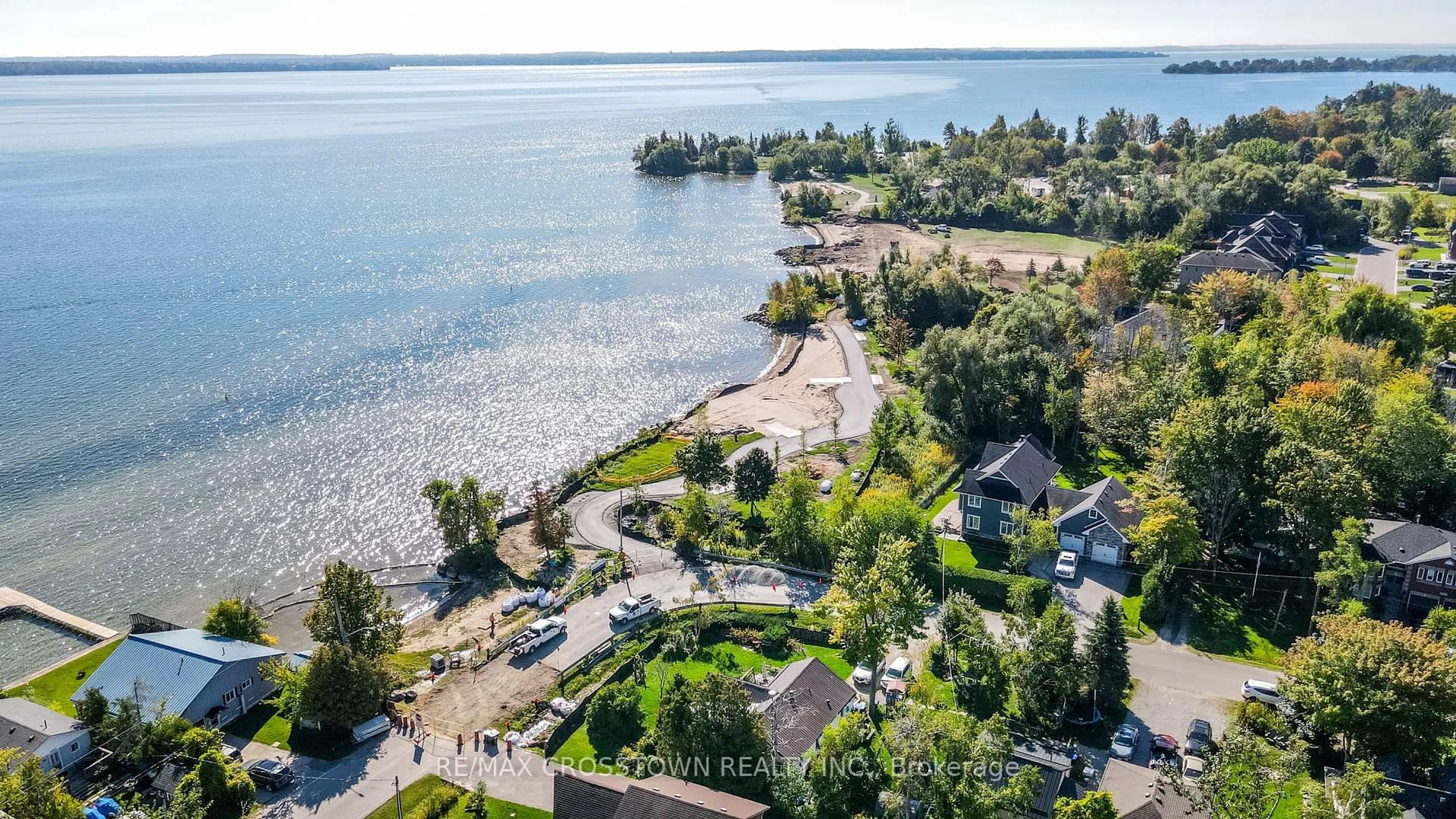 A pic from outside/outdoor area/front of a property/back of a property/a pic from drone, water/lake/river/ocean view for 673 Roberts Rd, Innisfil Ontario L9S 2E3