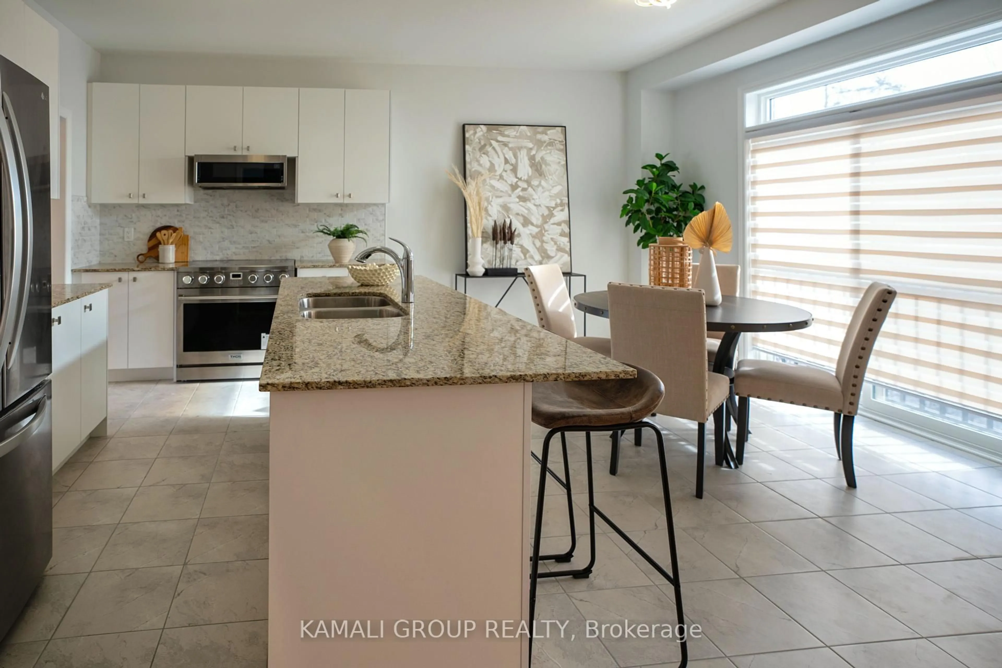 Open concept kitchen, ceramic/tile floor for 51 Ahchie Crt, Vaughan Ontario L6A 5E5