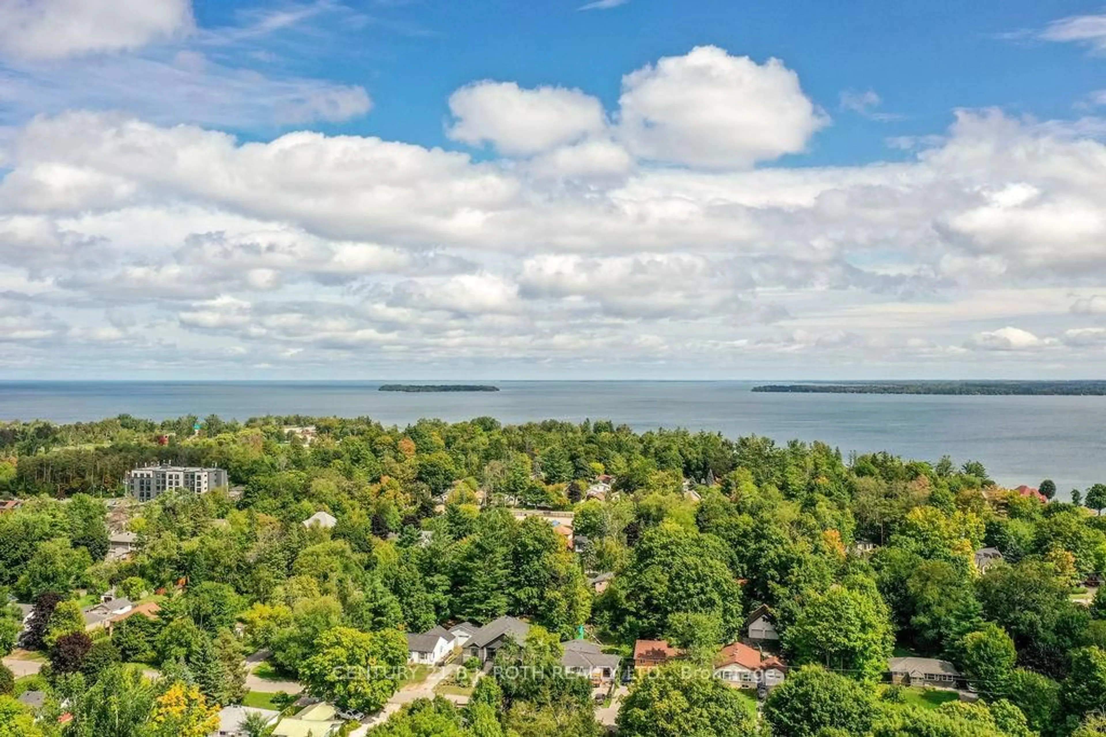 A pic from outside/outdoor area/front of a property/back of a property/a pic from drone, water/lake/river/ocean view for 2043 St Johns Rd, Innisfil Ontario L9S 1Y7
