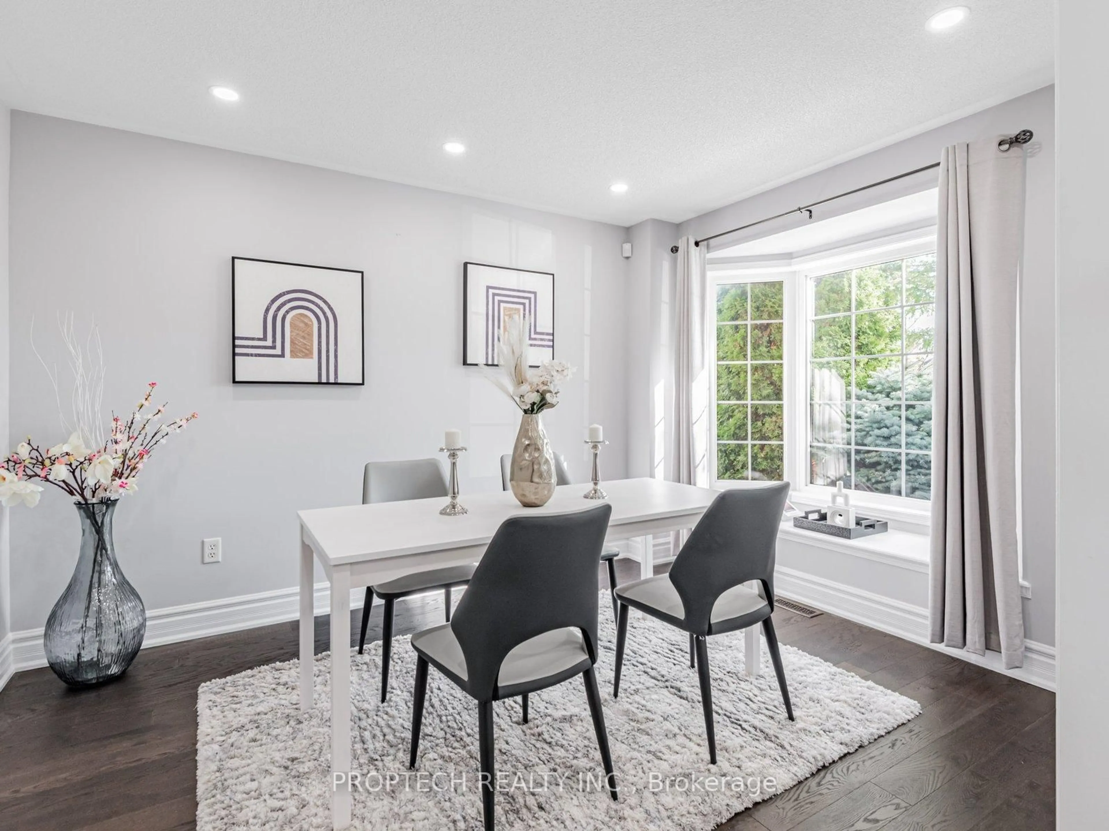 Dining room, wood/laminate floor for 16 Colchester St, Markham Ontario L6B 1K4