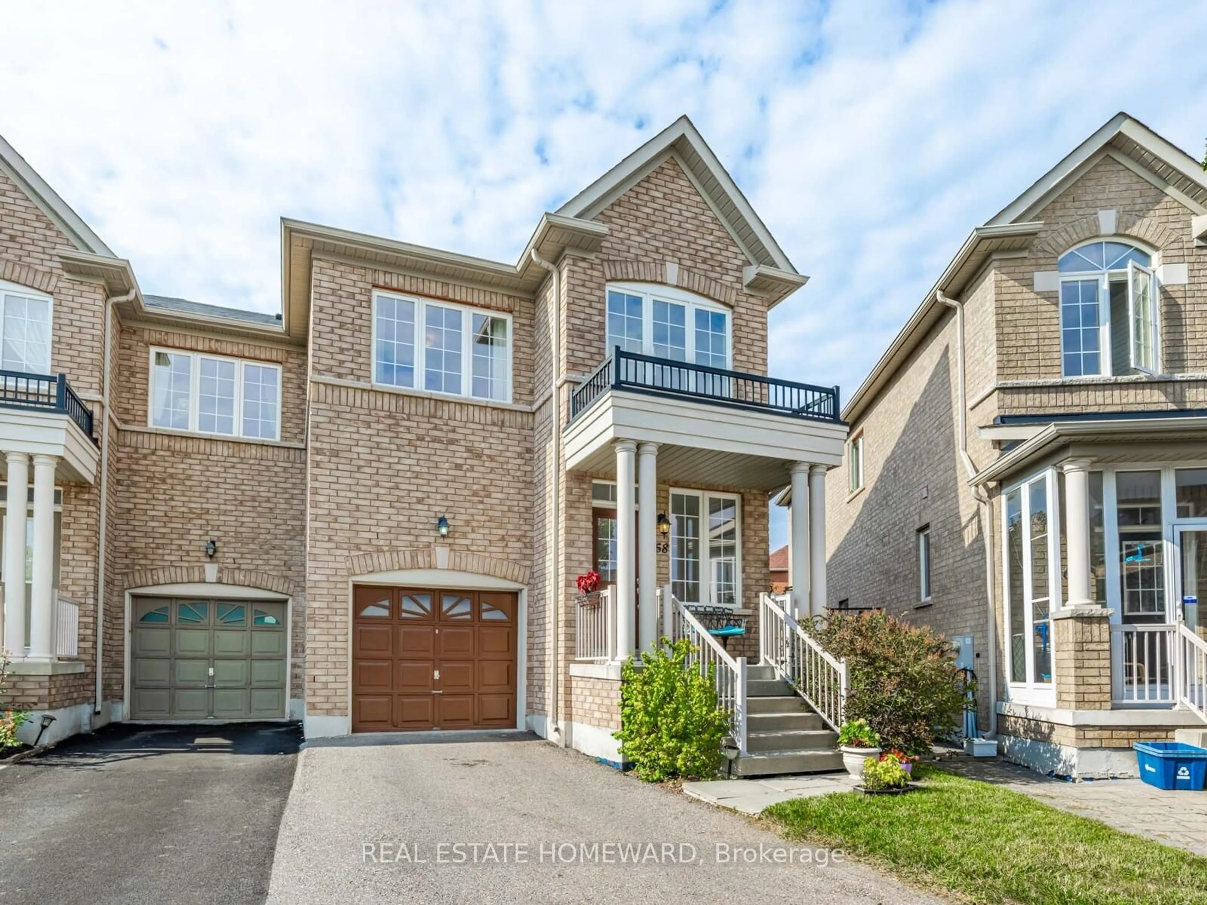 Home with brick exterior material, street for 58 Coleluke Lane, Markham Ontario L3S 0B7