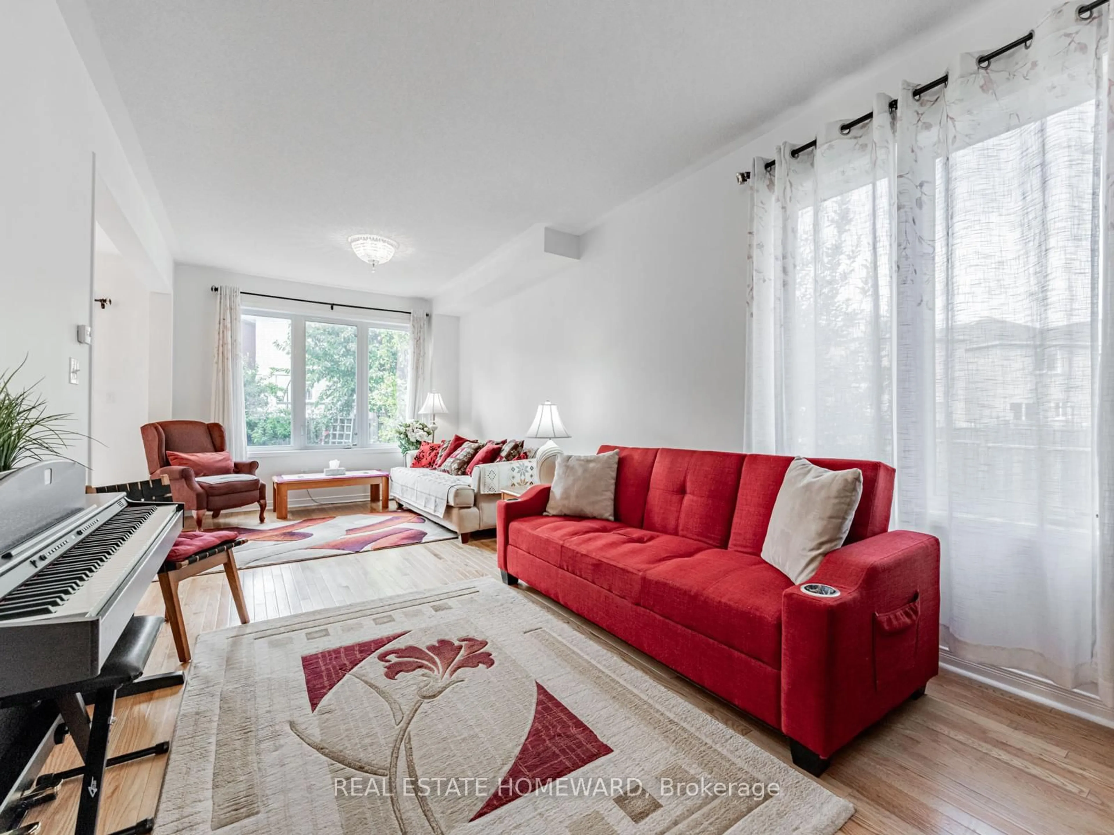 Living room with furniture, unknown for 58 Coleluke Lane, Markham Ontario L3S 0B7