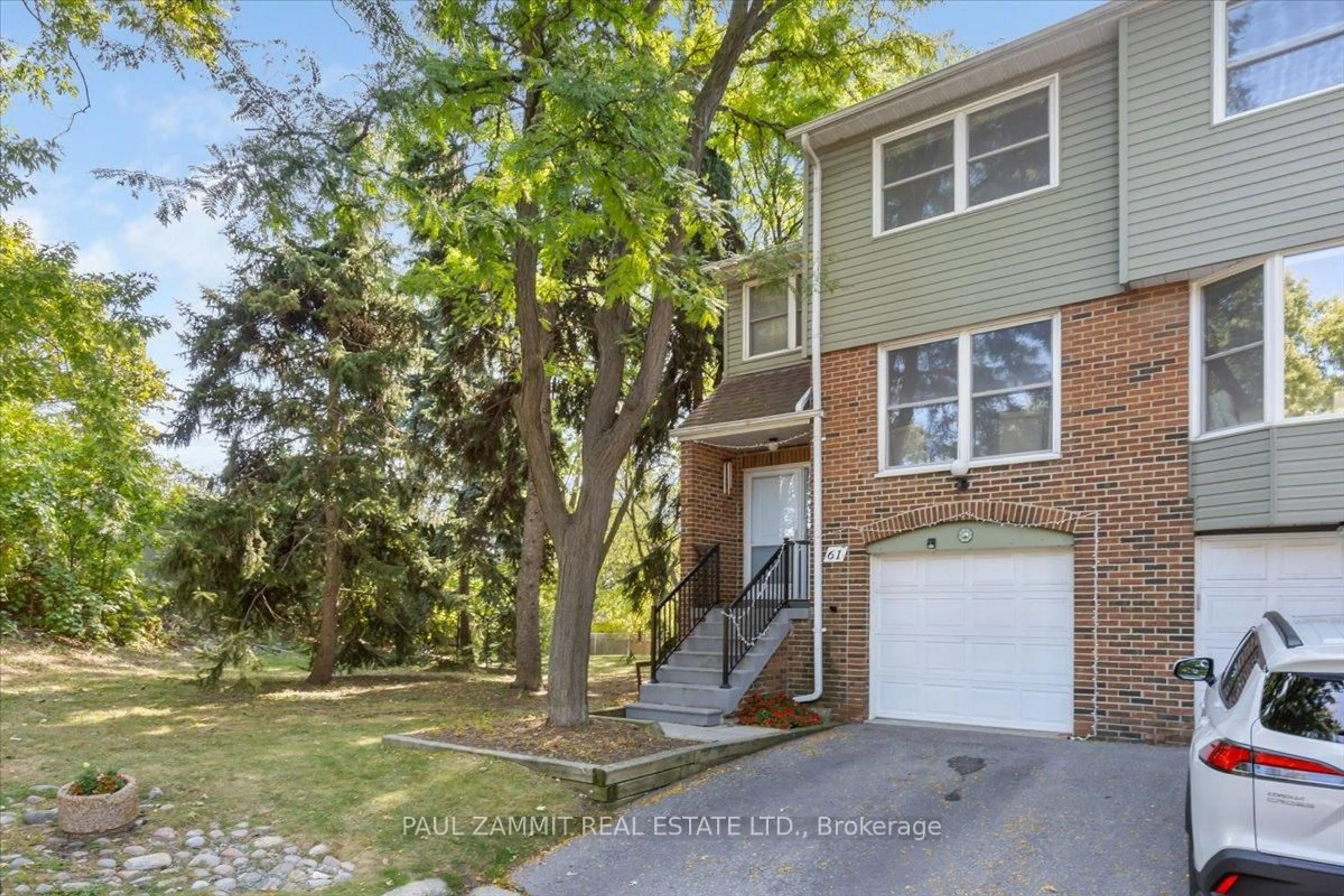 Home with brick exterior material, street for 61 Nottinghill Rd, Markham Ontario L3T 4Y3