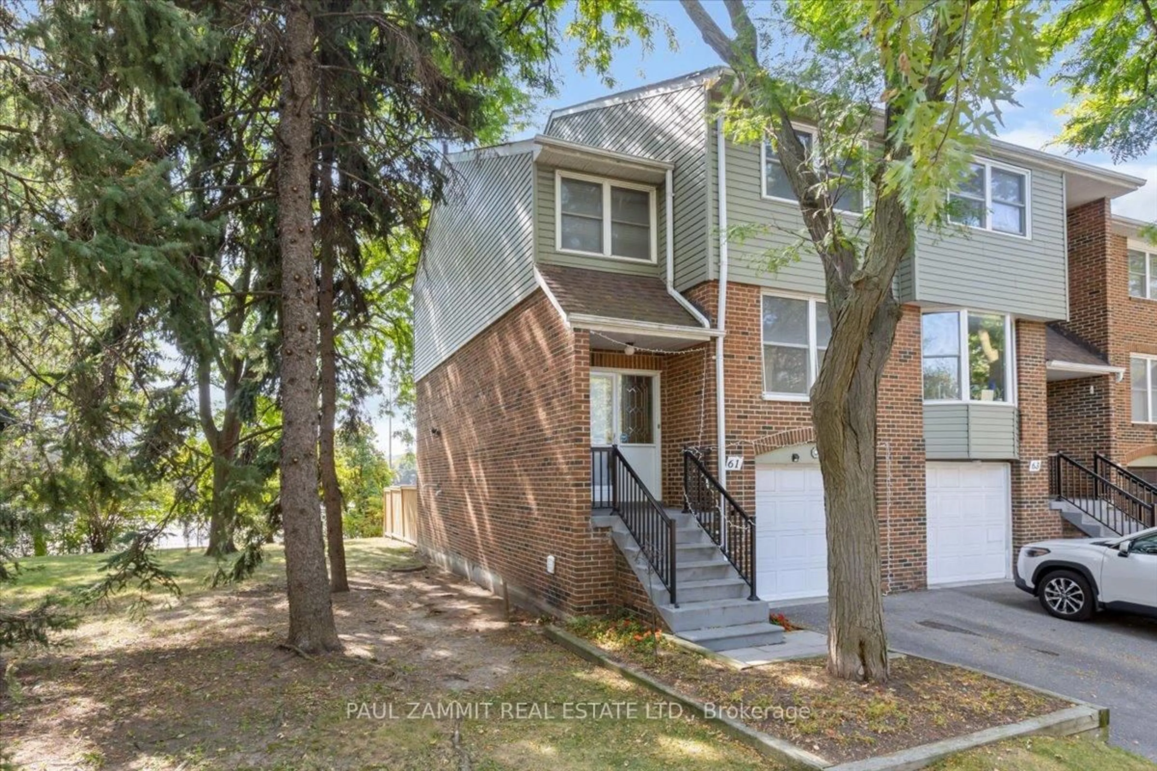 Home with brick exterior material, street for 61 Nottinghill Rd, Markham Ontario L3T 4Y3