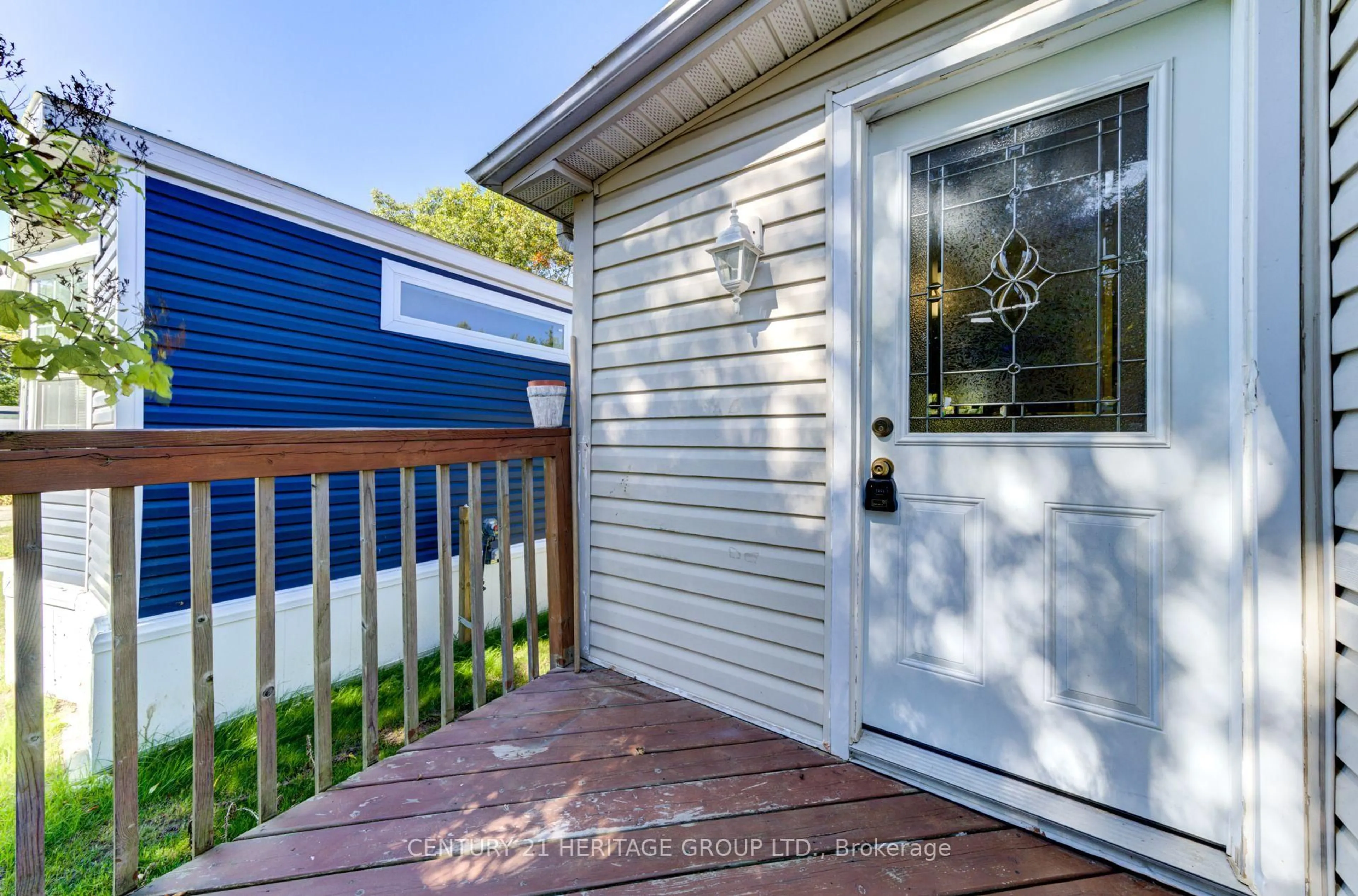 Home with vinyl exterior material, street for 42 Shamrock Cres, Essa Ontario L0M 1B1