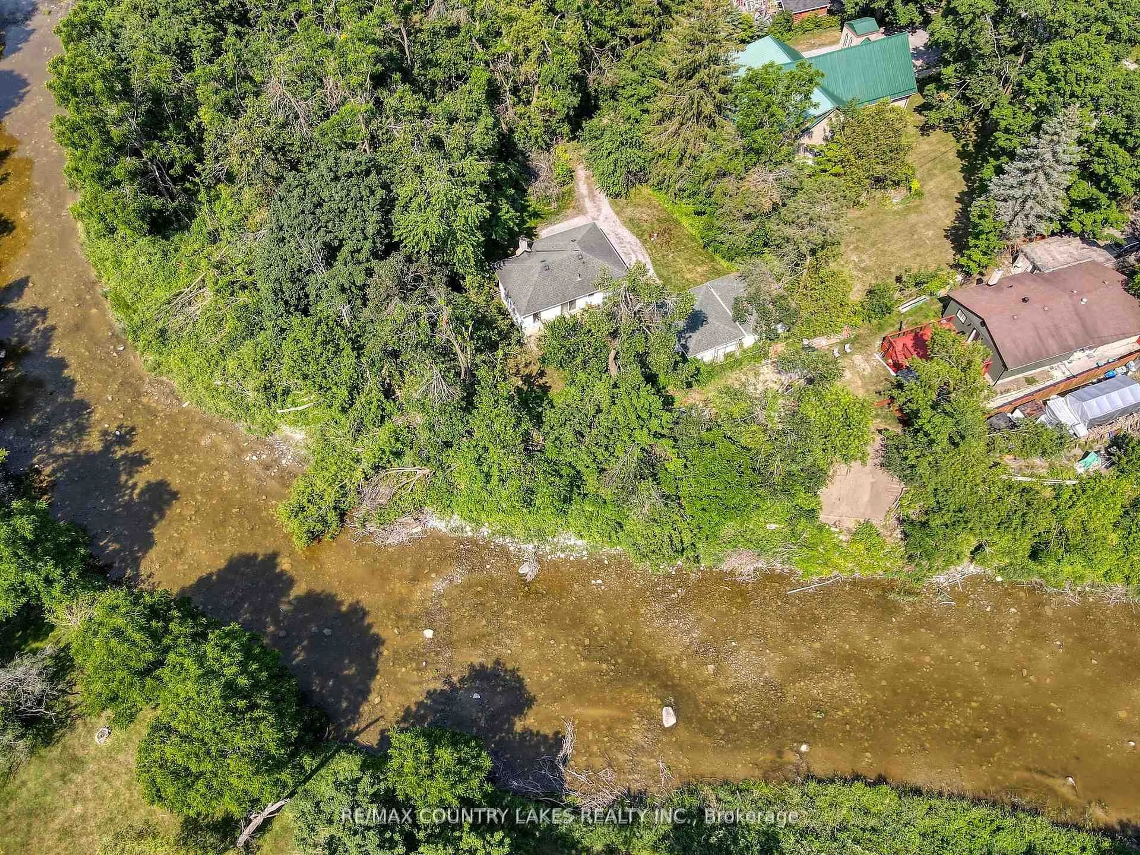 A pic from outside/outdoor area/front of a property/back of a property/a pic from drone, water/lake/river/ocean view for 413 Main St, Brock Ontario L0K 1A0