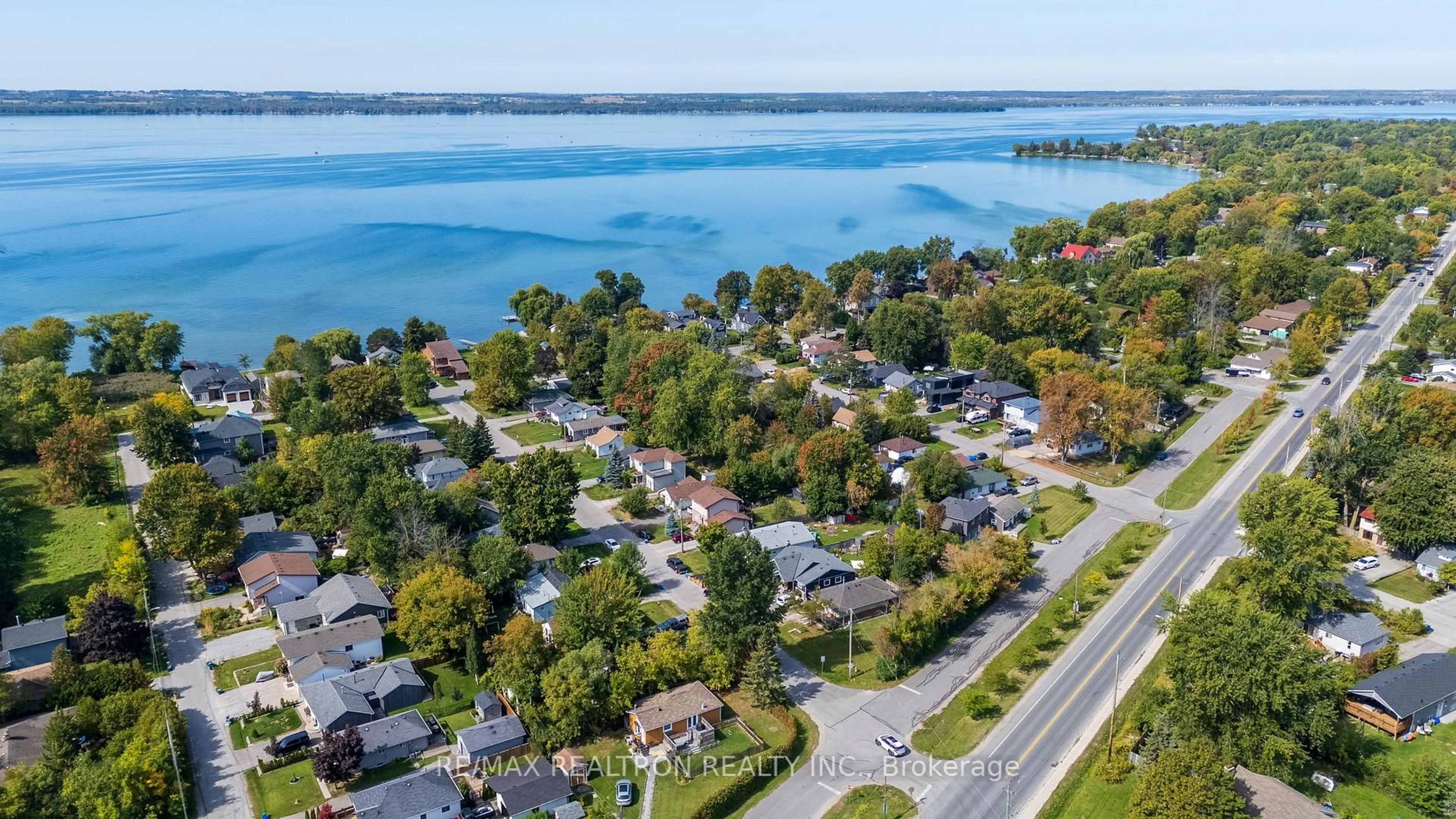 A pic from outside/outdoor area/front of a property/back of a property/a pic from drone, water/lake/river/ocean view for 183 Beach Rd, Georgina Ontario L4P 2L7