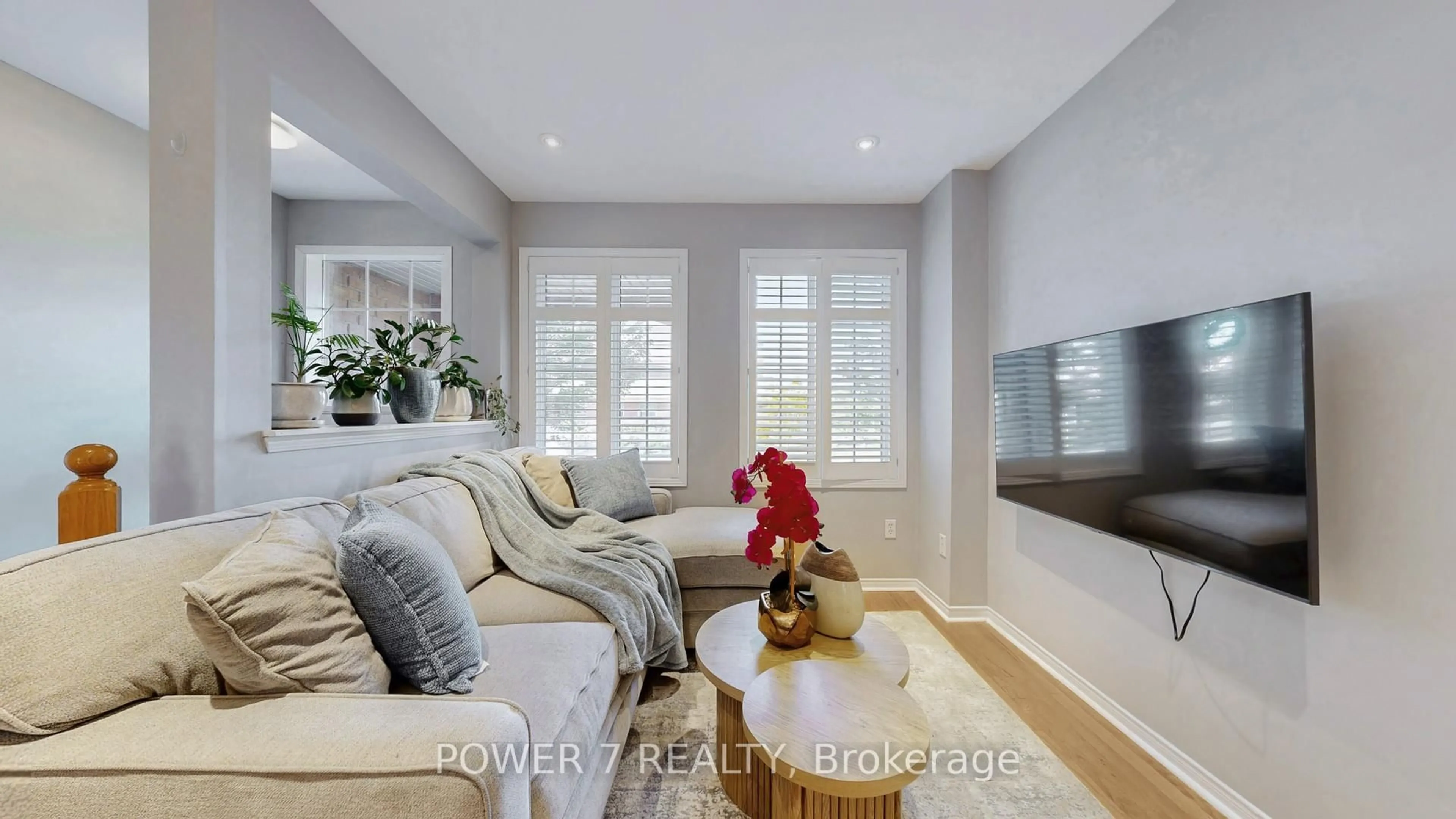 Living room with furniture, wood/laminate floor for 379 White's Hill Ave, Markham Ontario L6B 0J4