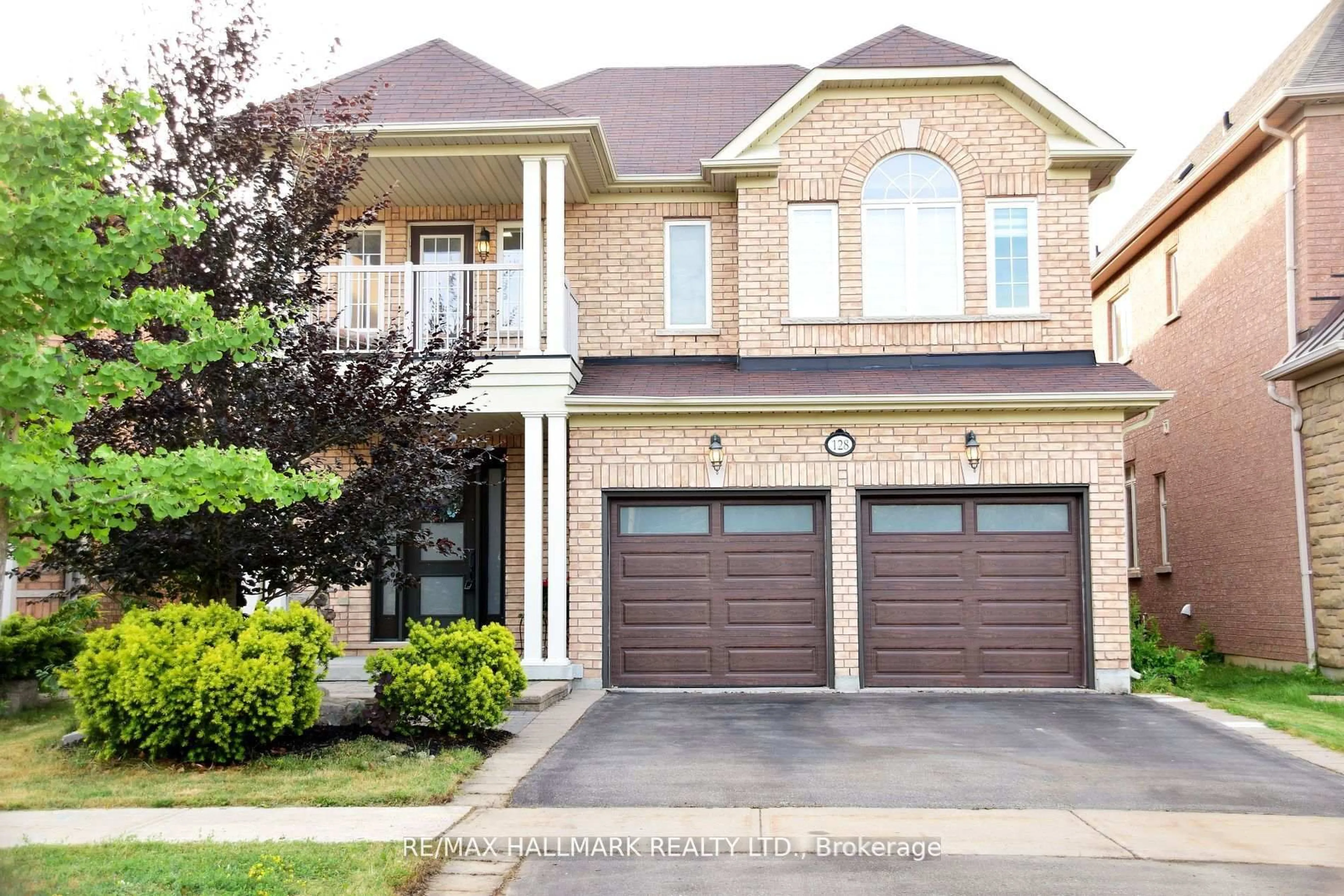 Home with brick exterior material, street for 128 Wolf Creek Cres, Vaughan Ontario L6A 4C1