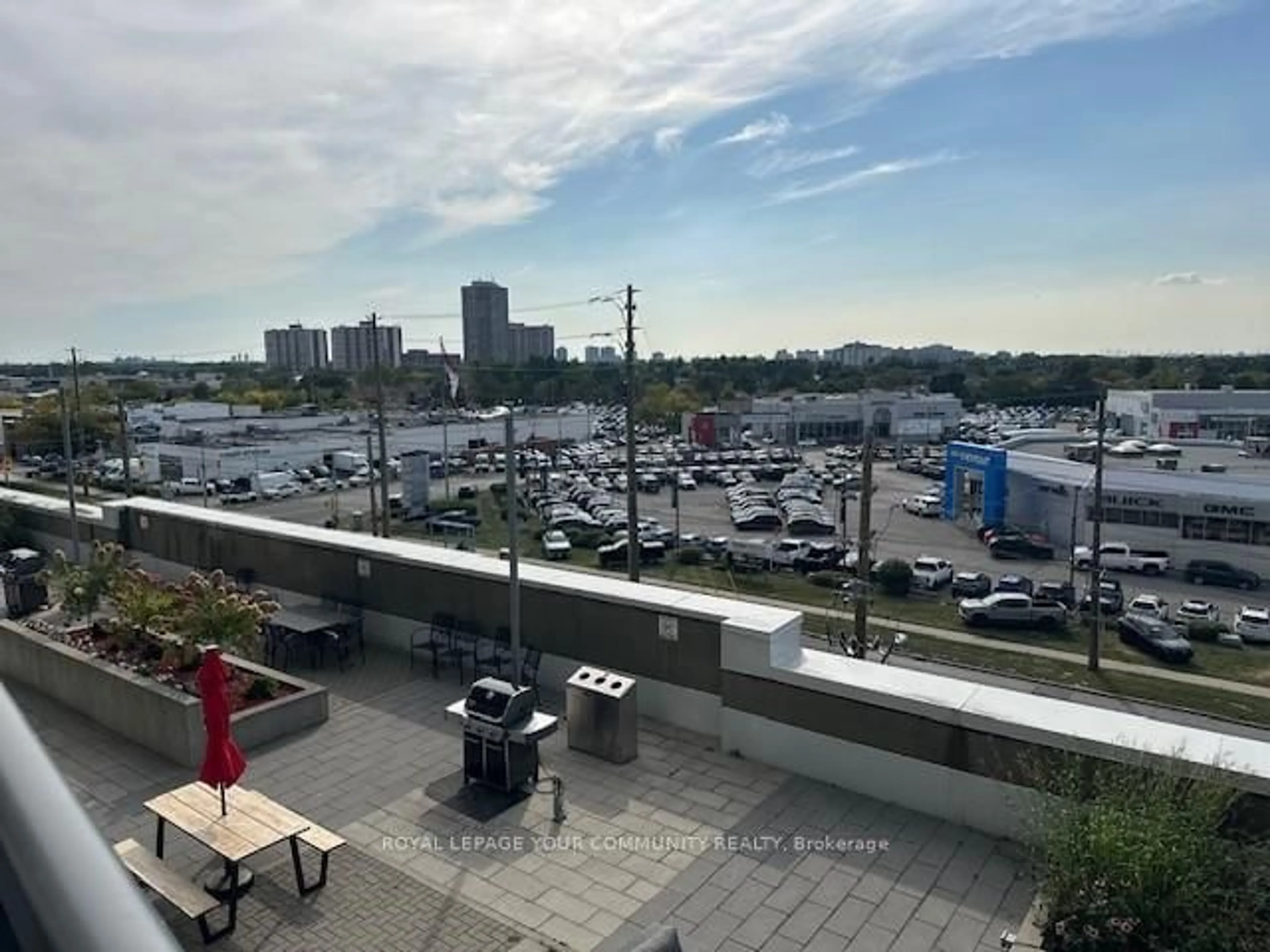 Patio, city buildings view from balcony for 7171 Yonge St #415, Markham Ontario L3T 0C8