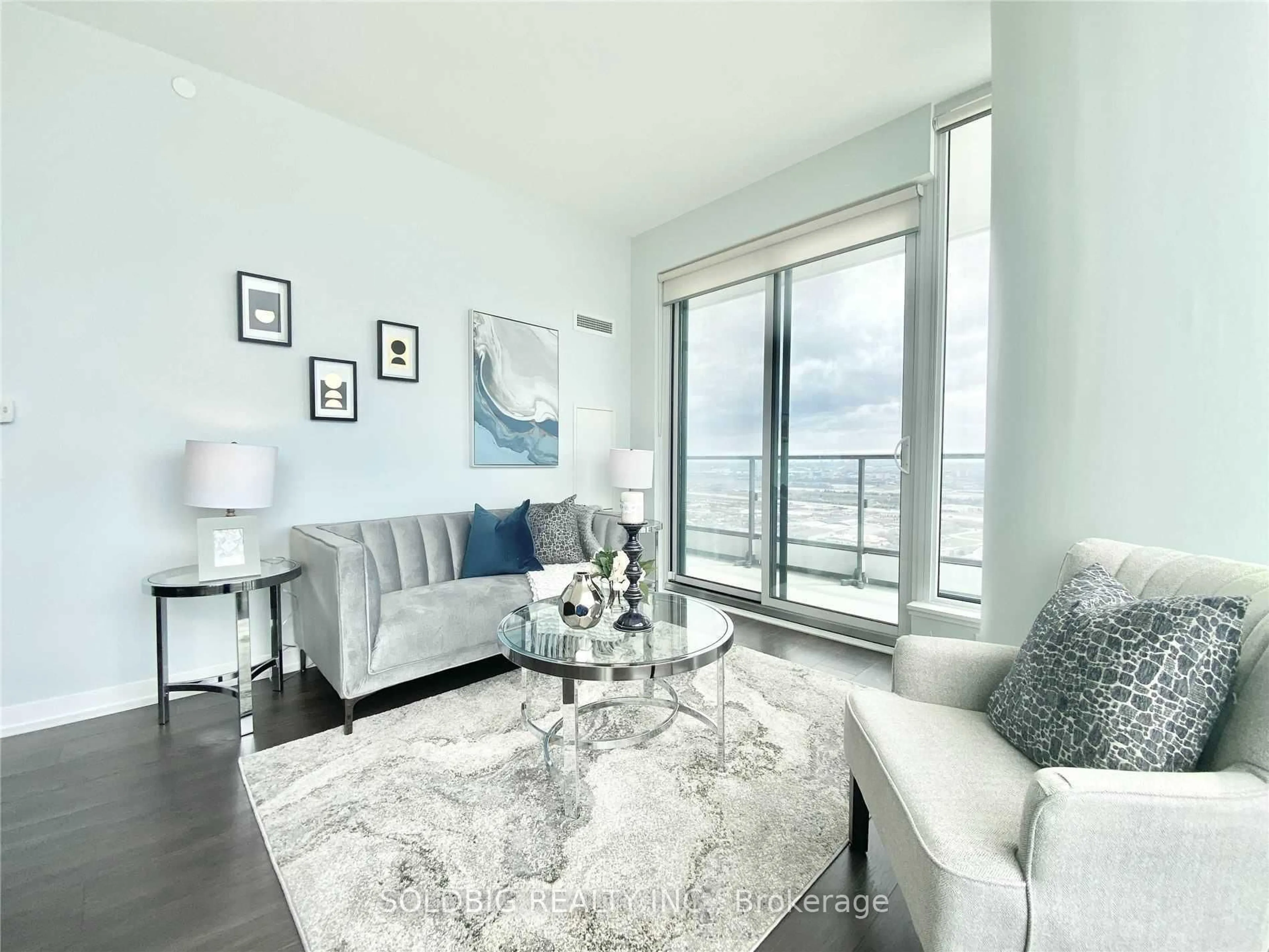 Living room with furniture, unknown for 898 Portage Pkwy #4909, Vaughan Ontario L4K 0J6