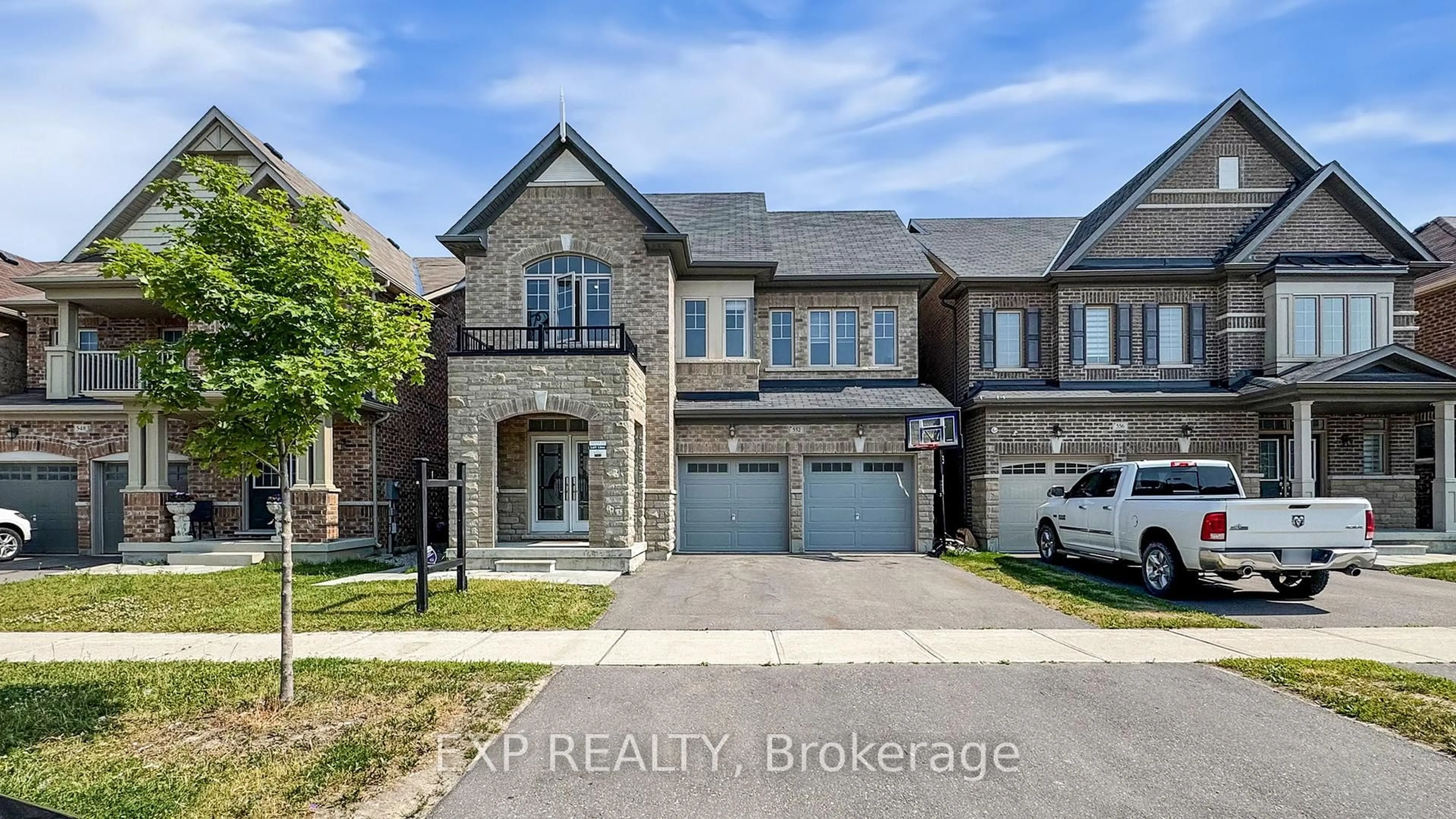 Home with brick exterior material, street for 552 Mactier Dr, Vaughan Ontario L4H 4L5
