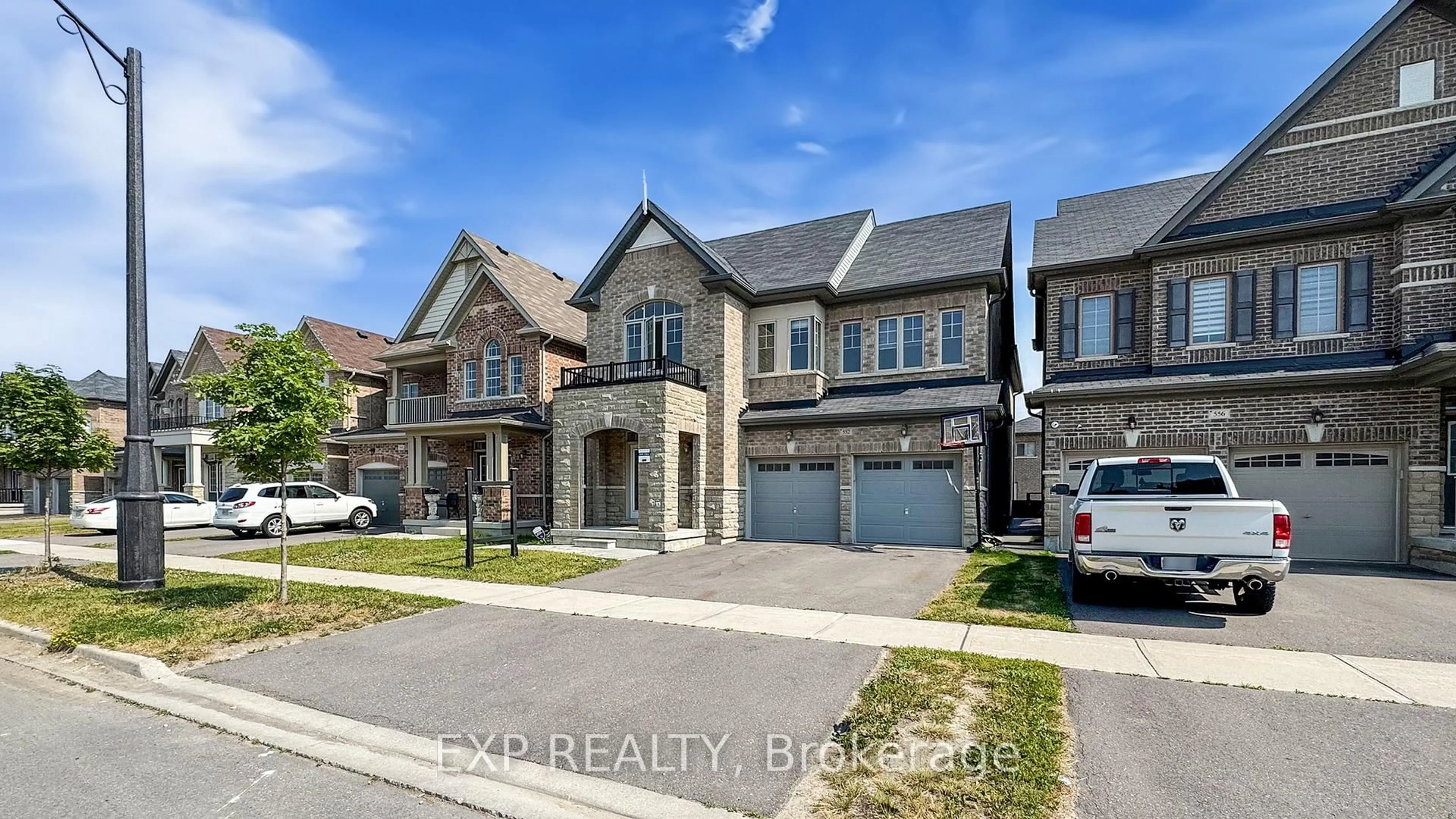 Home with brick exterior material, street for 552 Mactier Dr, Vaughan Ontario L4H 4L5