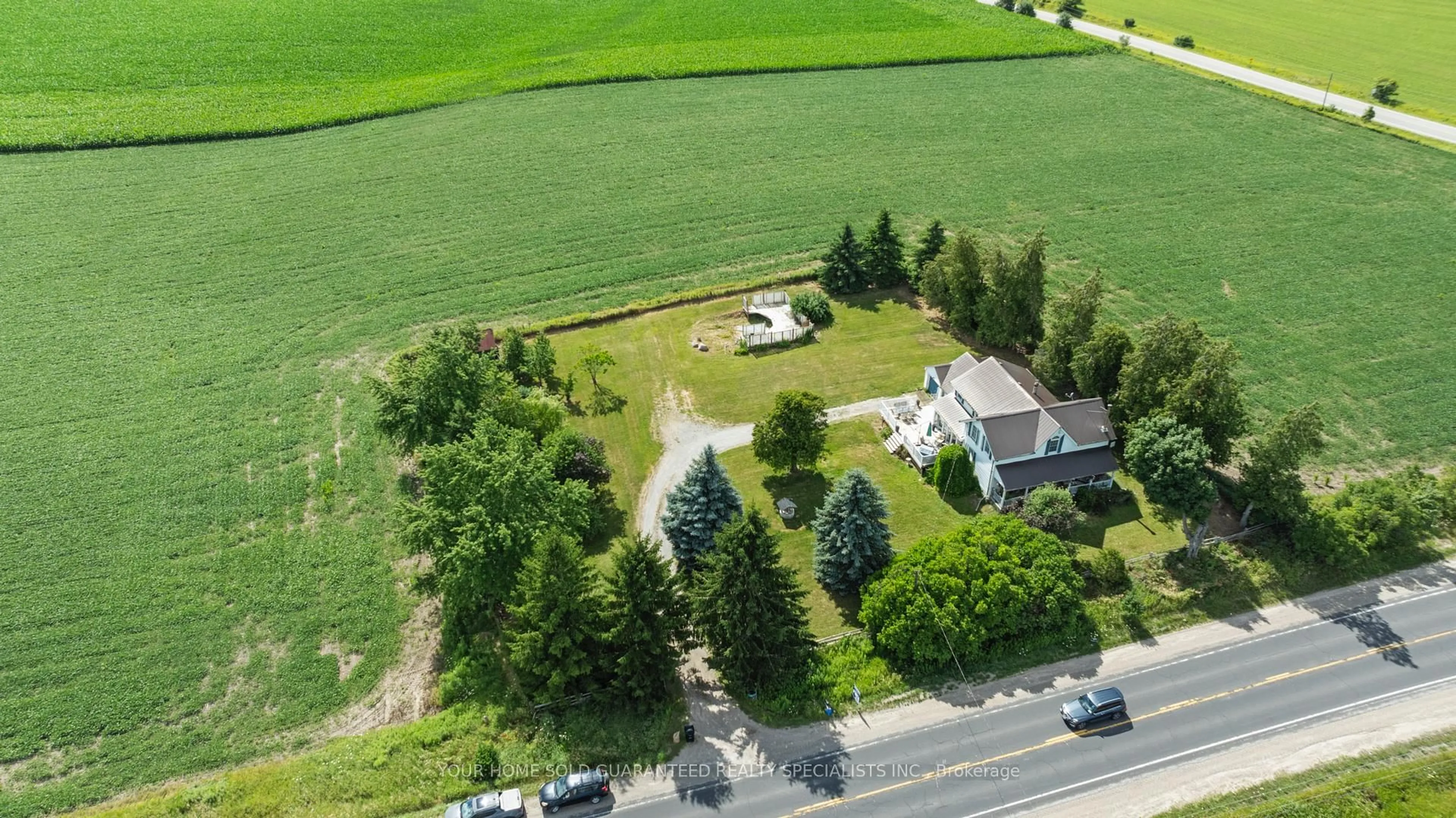 A pic from outside/outdoor area/front of a property/back of a property/a pic from drone, street for 3440 Highway 27, Bradford West Gwillimbury Ontario L3Z 3X1