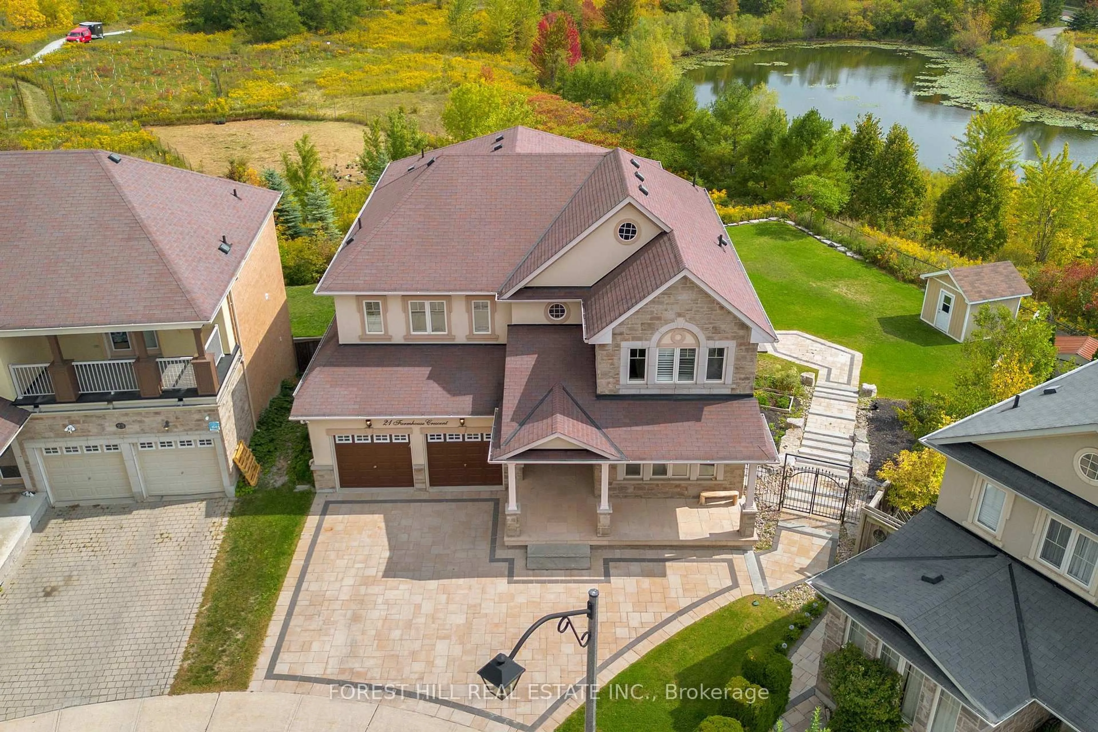 A pic from outside/outdoor area/front of a property/back of a property/a pic from drone, water/lake/river/ocean view for 21 Farmhouse Cres, Richmond Hill Ontario L4E 0S7