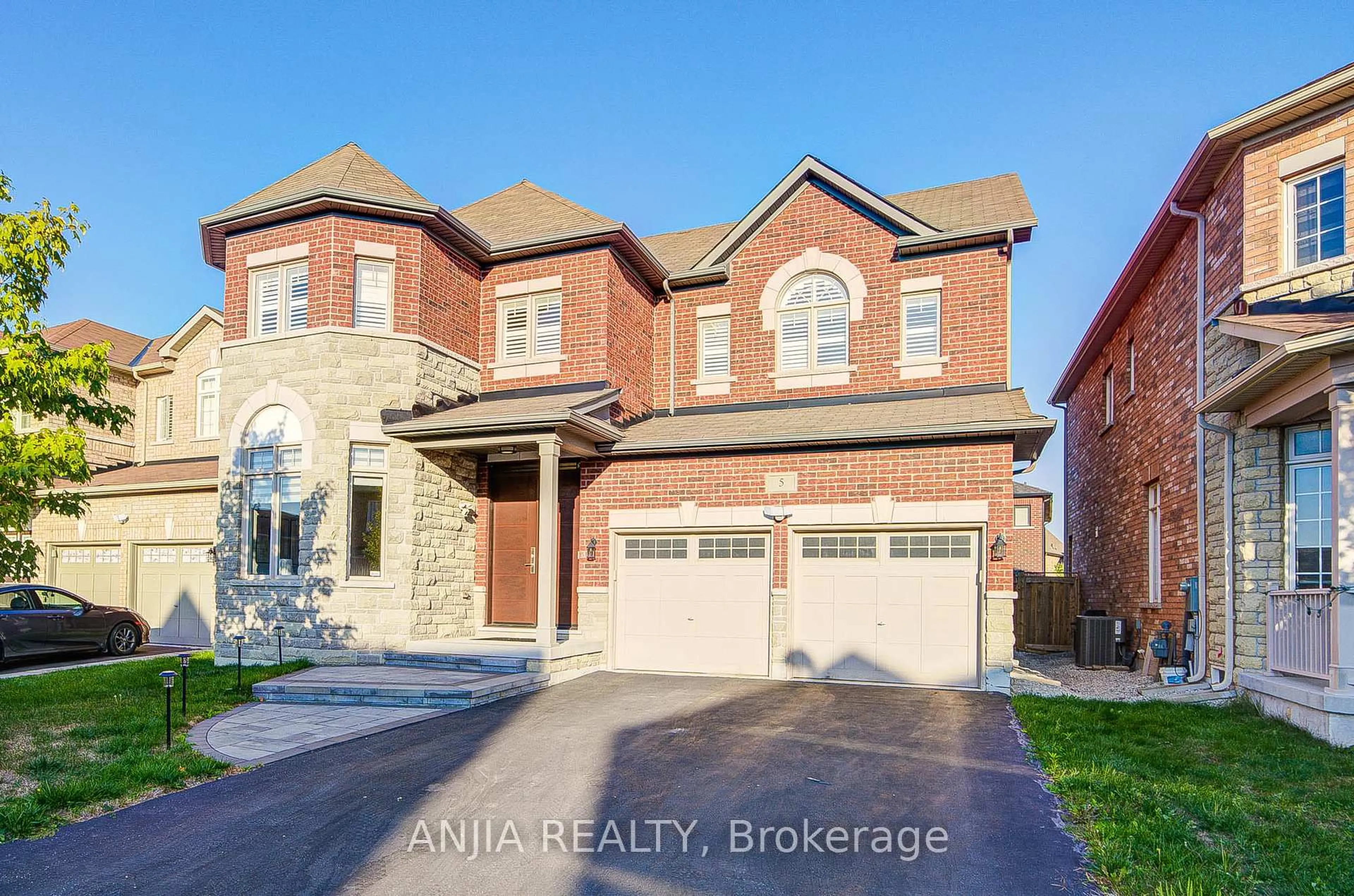 Home with brick exterior material, street for 5 Warton Crt, Markham Ontario L6E 2G1